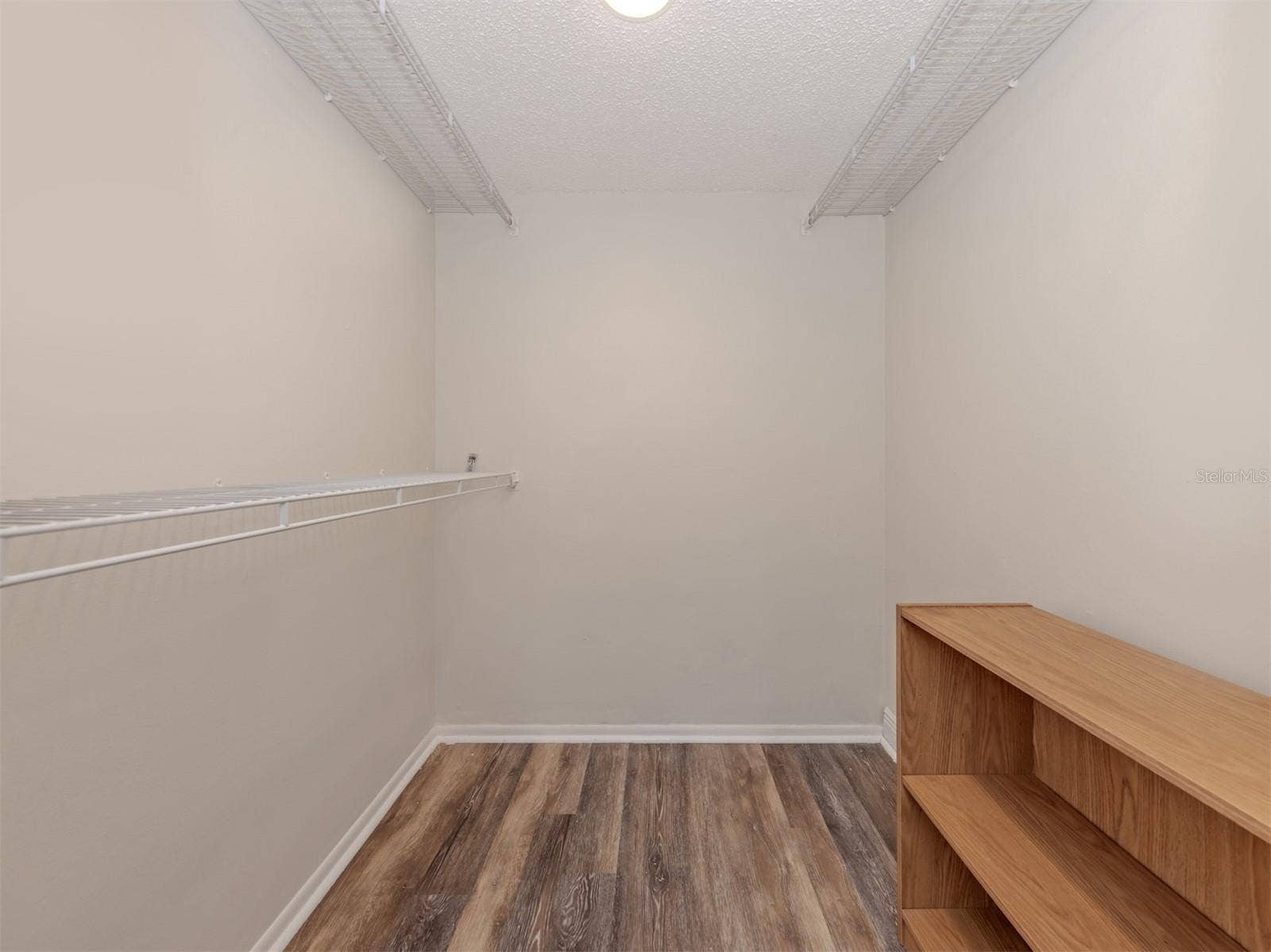 808 CAPRI ISLES BLVD, #111, Venice, FL 34292 master walk in closet