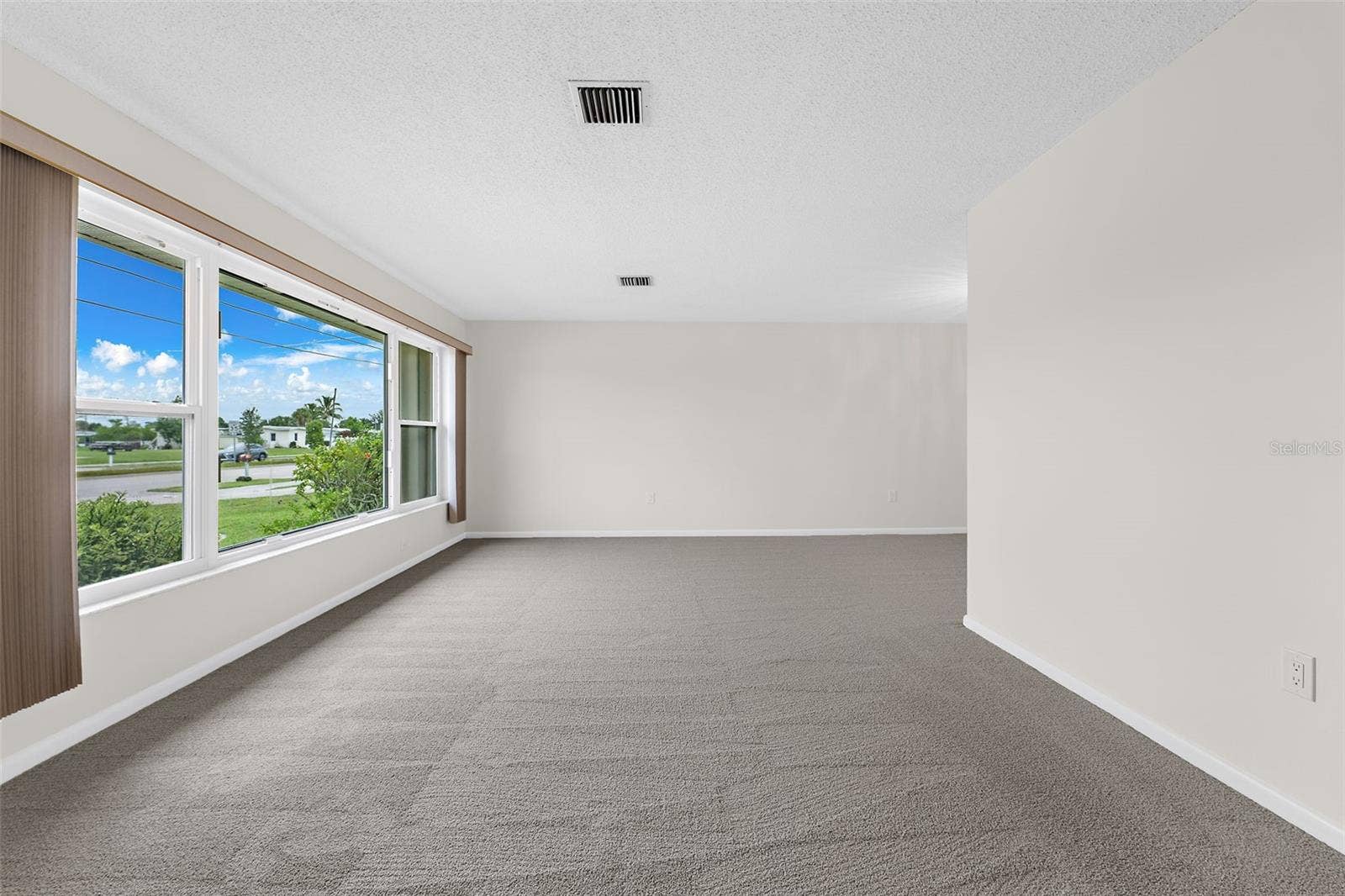 Living room view. IMPACT windows throughout