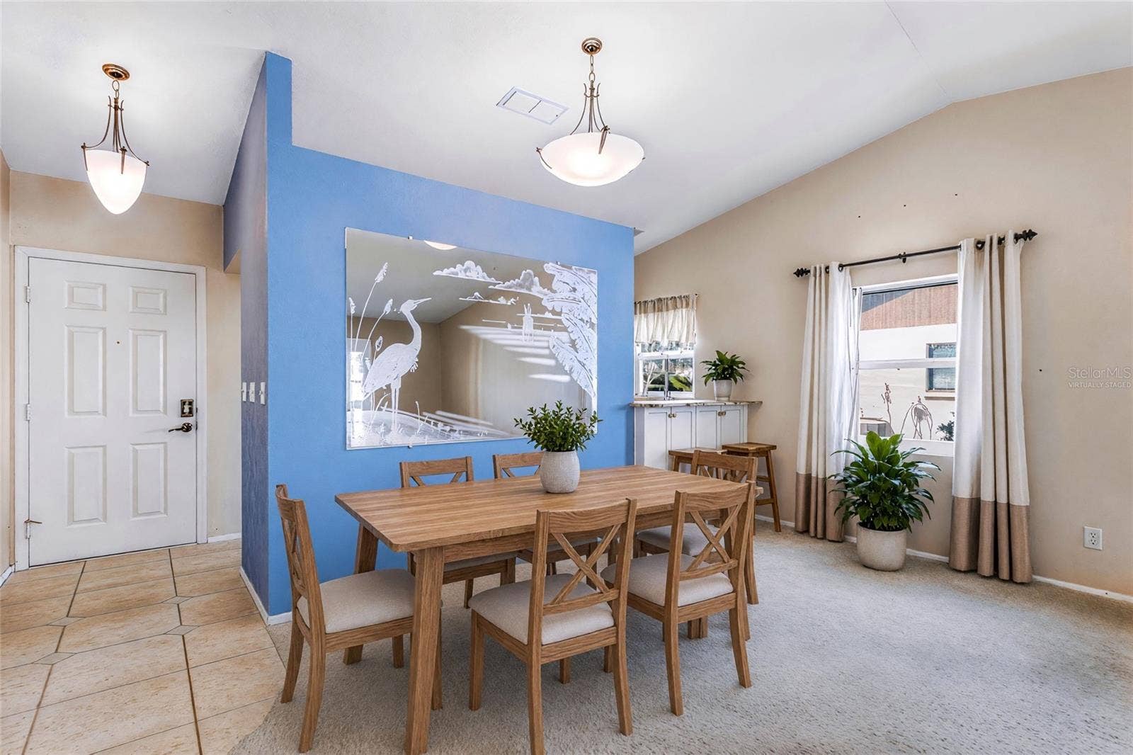 1704 CURRY AVENUE, #39, Nokomis, FL 34275 Virtually Staged - Dining area and Bar seating