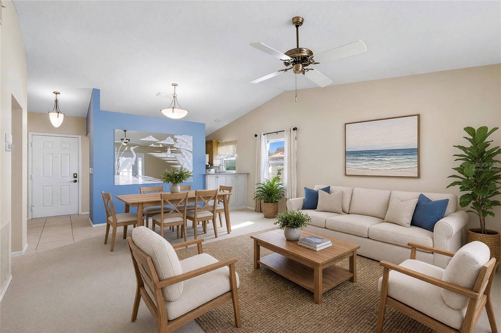 1704 CURRY AVENUE, #39, Nokomis, FL 34275 Virtually Staged - Living Room and Dining Room
