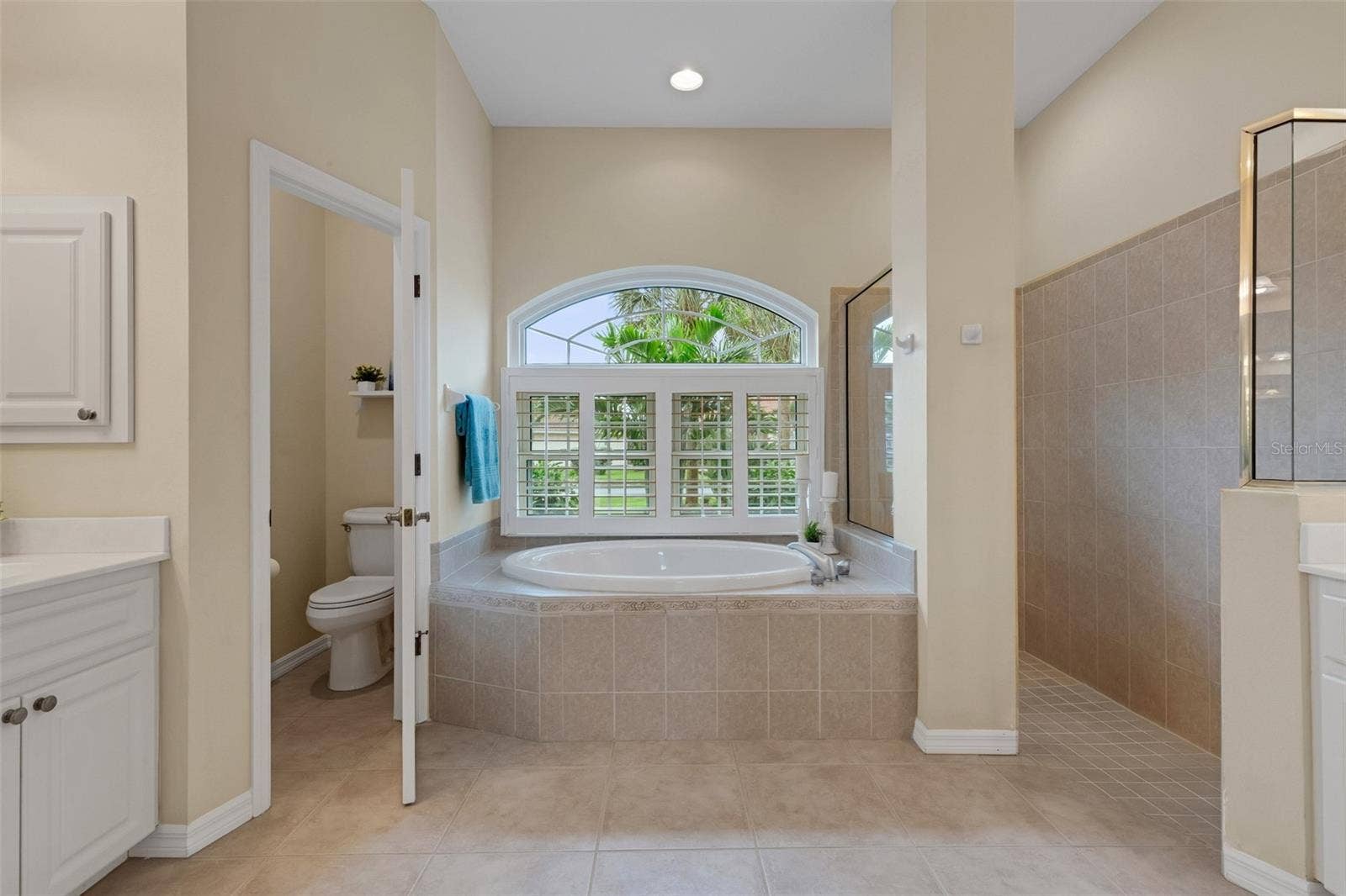 En-suite bathroom  Walk in shower, tub and 2 vanities