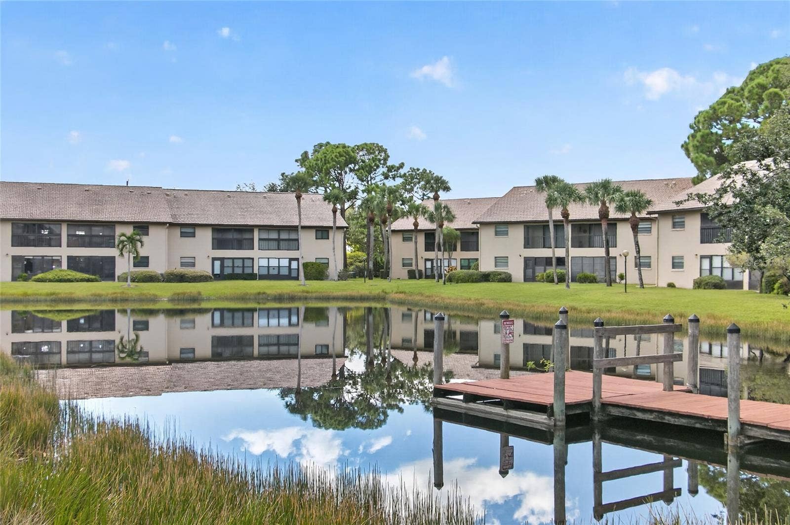 360 THREE LAKES LANE, #H, Venice, FL 34285 Enjoy water view from lanai