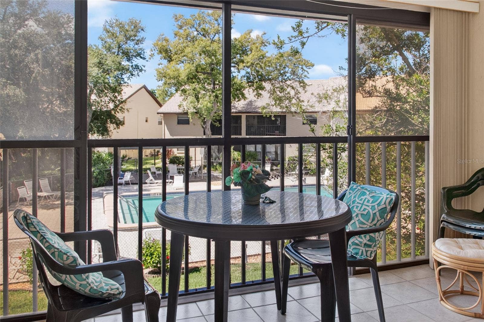 360 THREE LAKES LANE, #H, Venice, FL 34285 Enjoy pool view from lanai