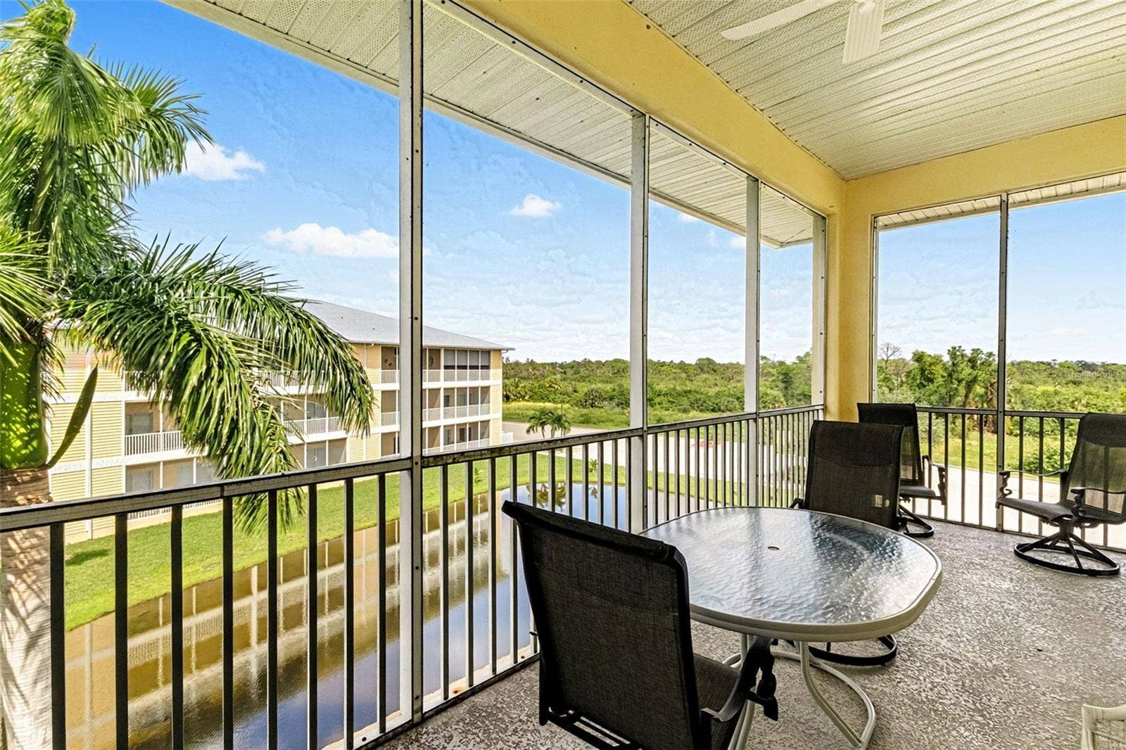 101 NATURES WAY, #1307, Rotonda West, FL 33947 Patio view of preserve and pond with fountain ( nnot on at time of pictures)