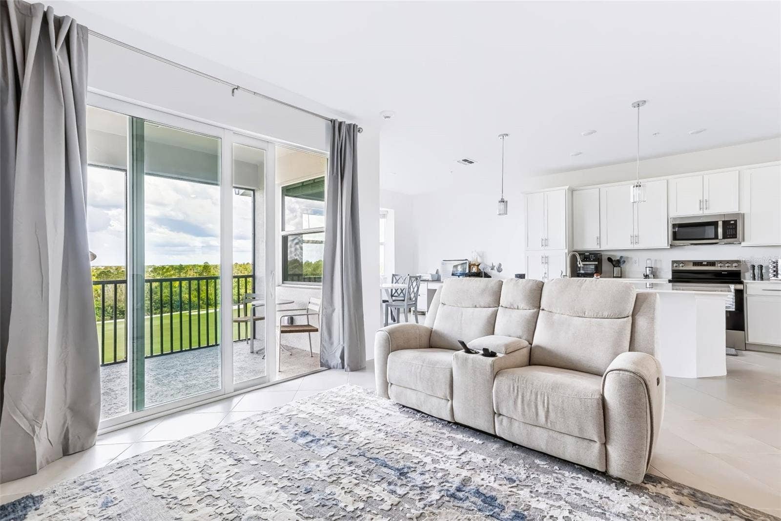 17600 OPAL SAND DRIVE, #402, Venice, FL 34293 Living Room/Balcony