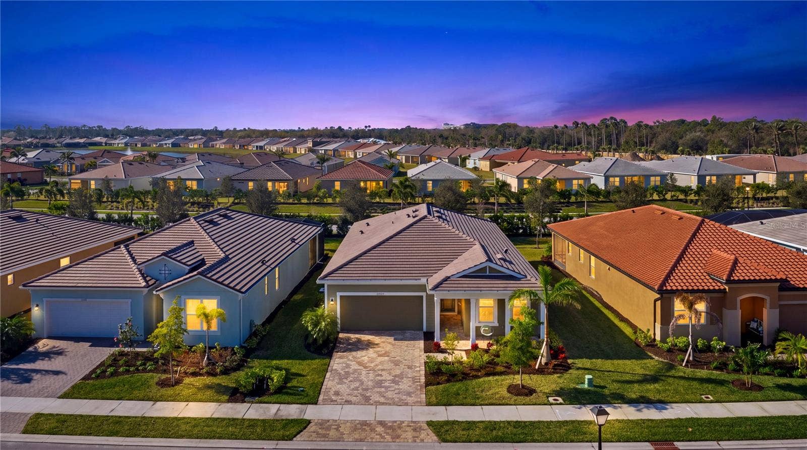 11925 BOHEMIAN PLACE, Venice, FL 34293 Aerial Front Elevation (Virtual Twilight)