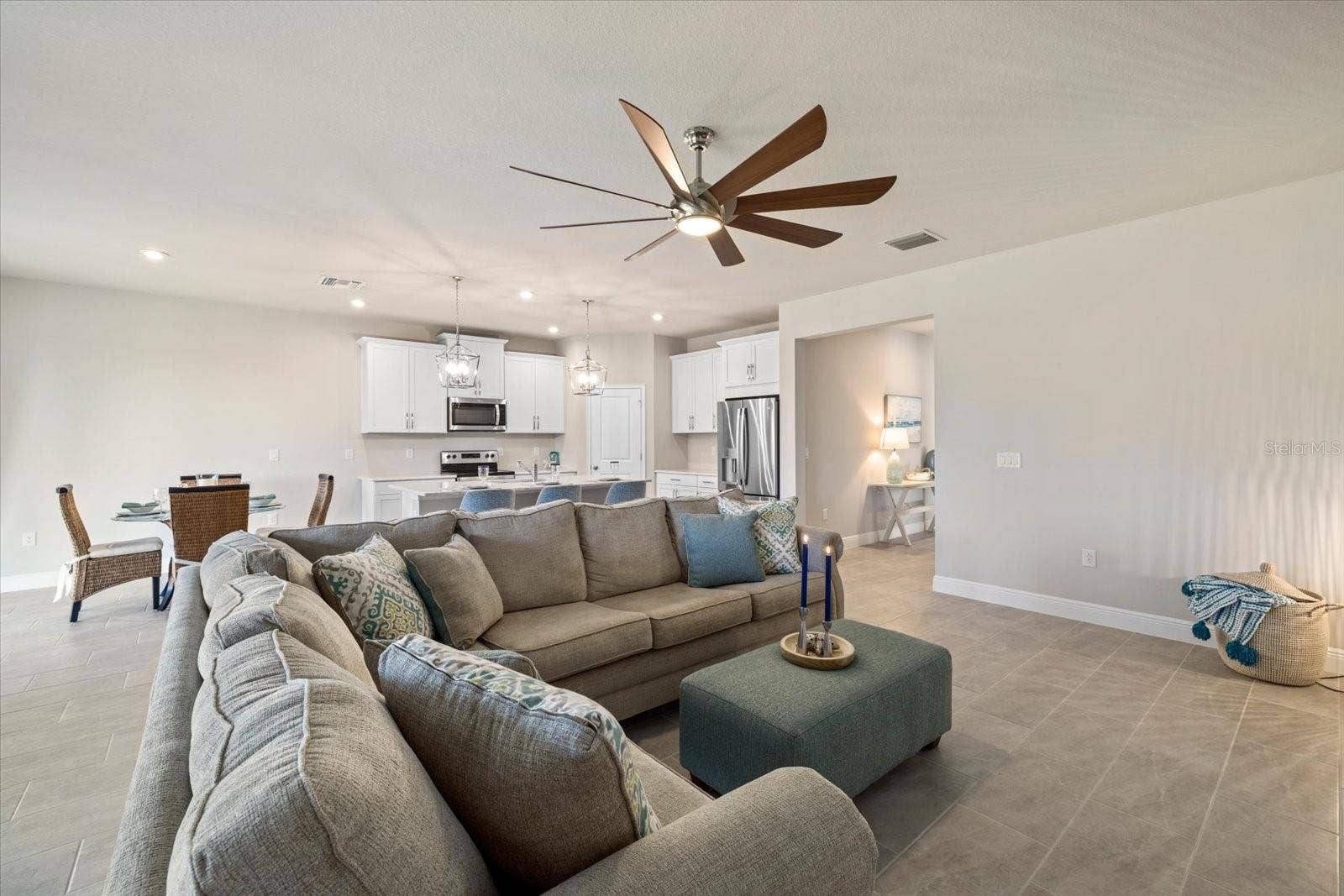 11925 BOHEMIAN PLACE, Venice, FL 34293 Living Room into Kitchen and Dining Room