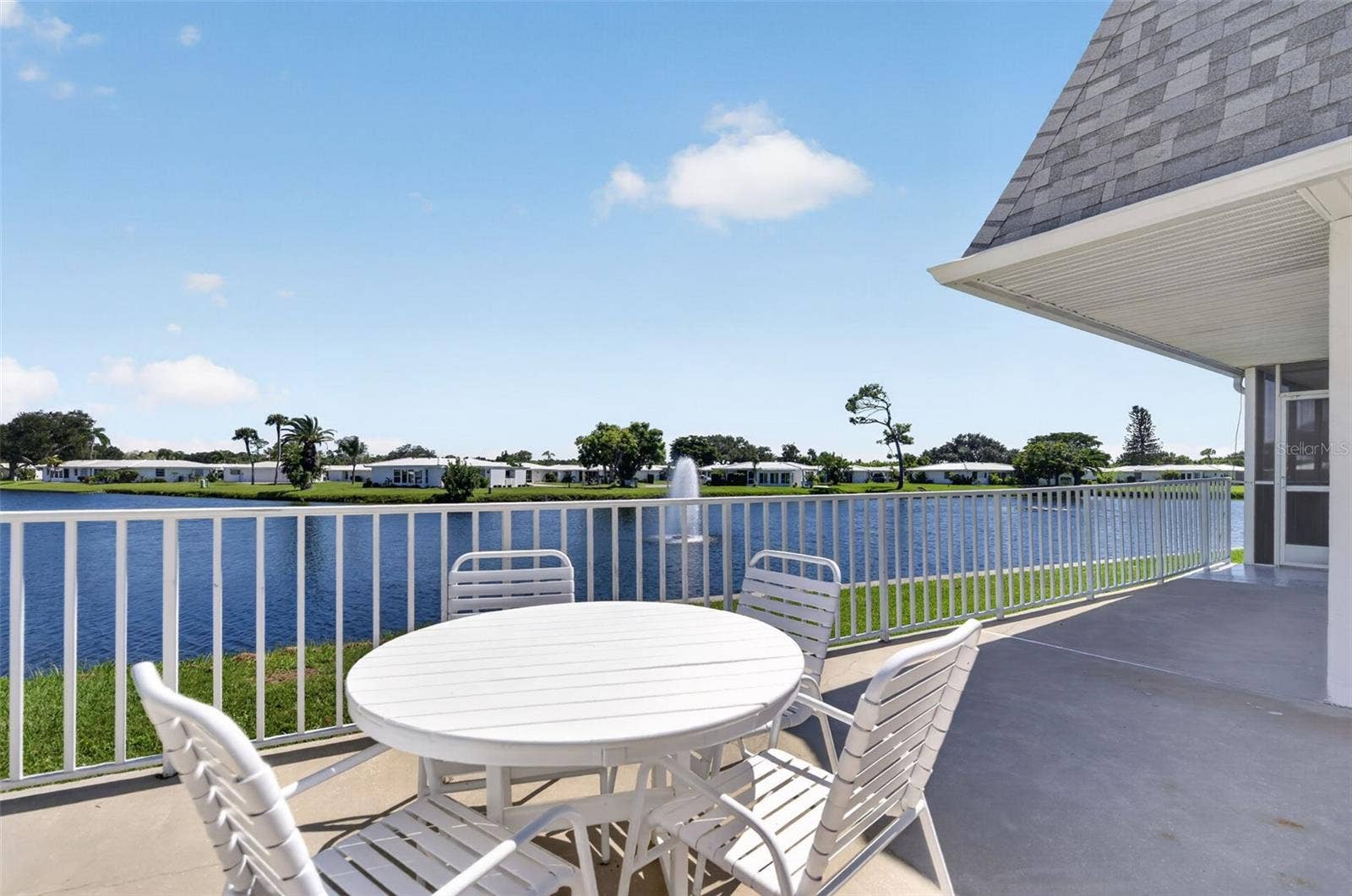 82 CIRCLEWOOD DRIVE, #A3-4, Venice, FL 34293 Patio area near community pool