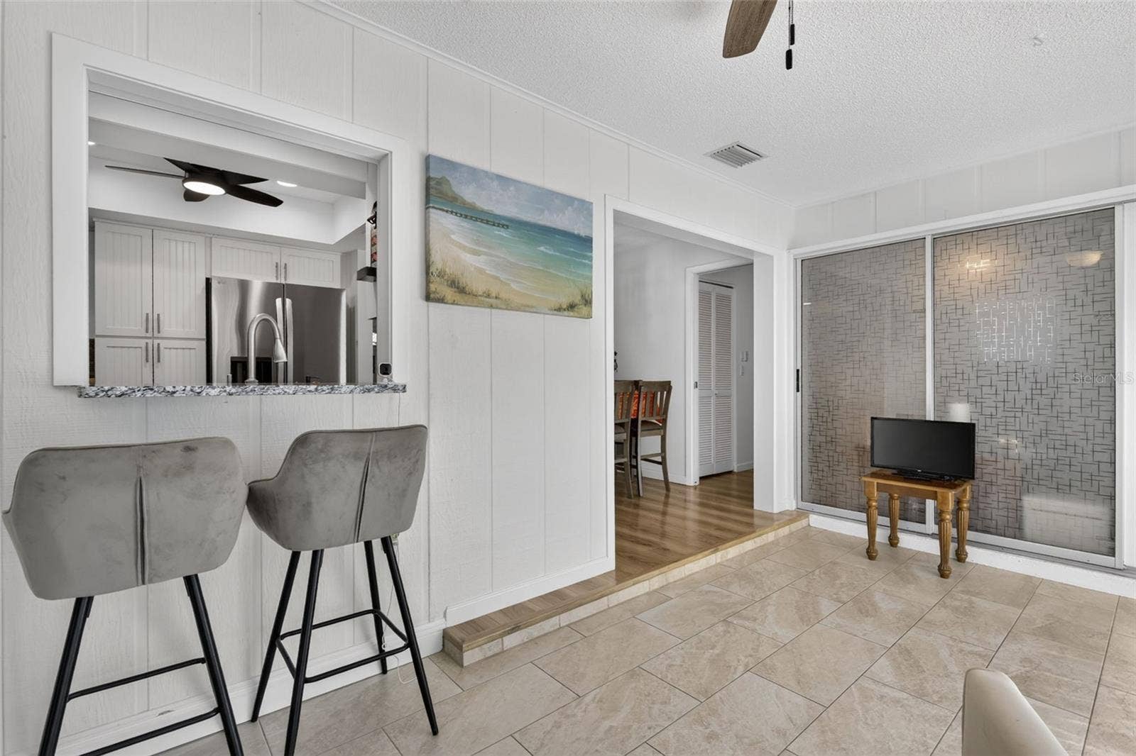 82 CIRCLEWOOD DRIVE, #A3-4, Venice, FL 34293 Family room looking toward kitchen