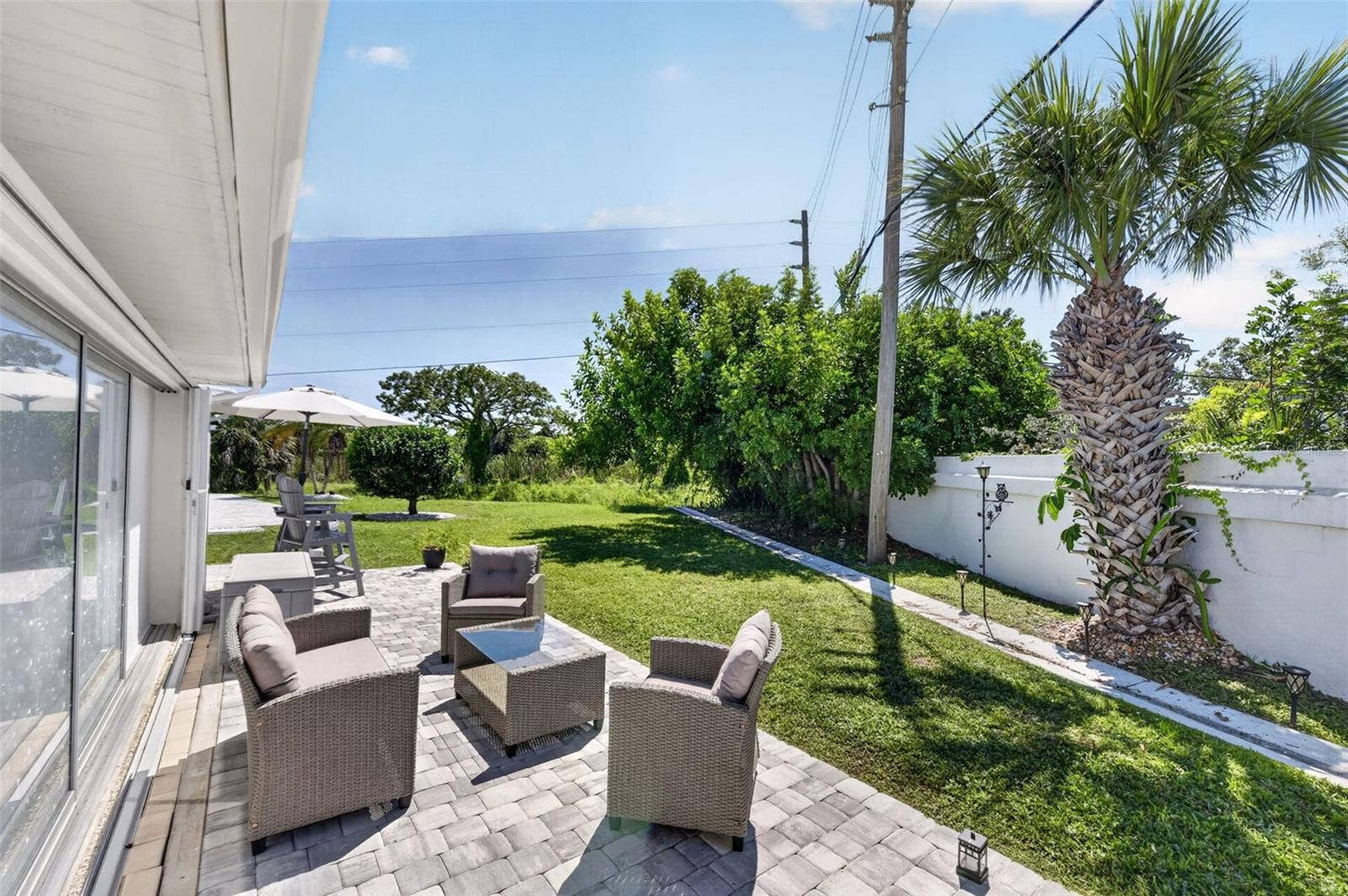 82 CIRCLEWOOD DRIVE, #A3-4, Venice, FL 34293 Outdoor patio with view of yard space