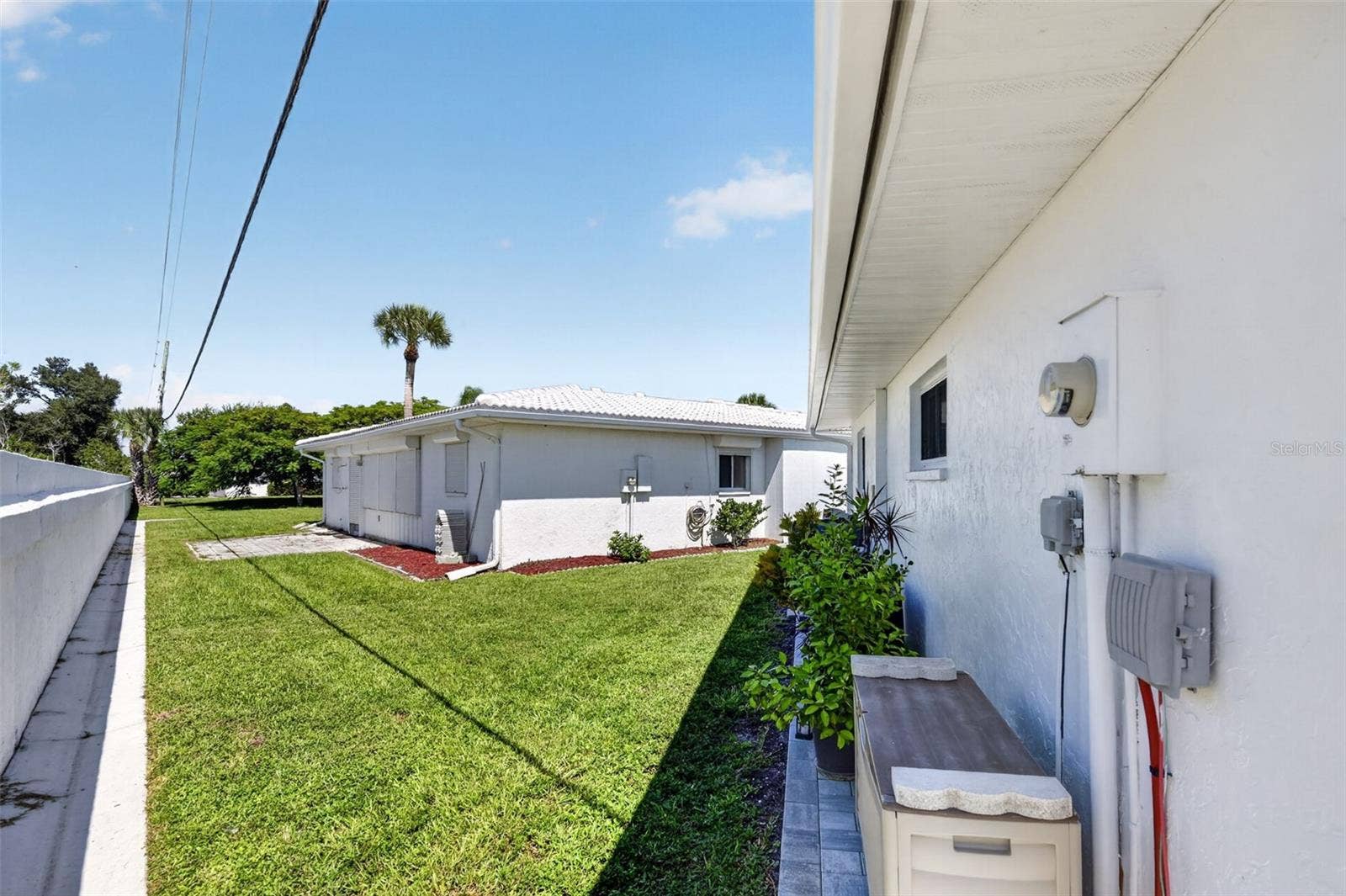 82 CIRCLEWOOD DRIVE, #A3-4, Venice, FL 34293 Pavers installed side of home 2026