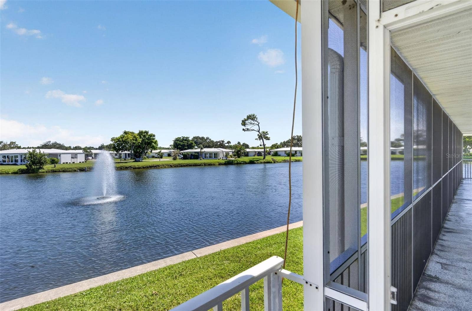 82 CIRCLEWOOD DRIVE, #A3-4, Venice, FL 34293 Pond near community pool