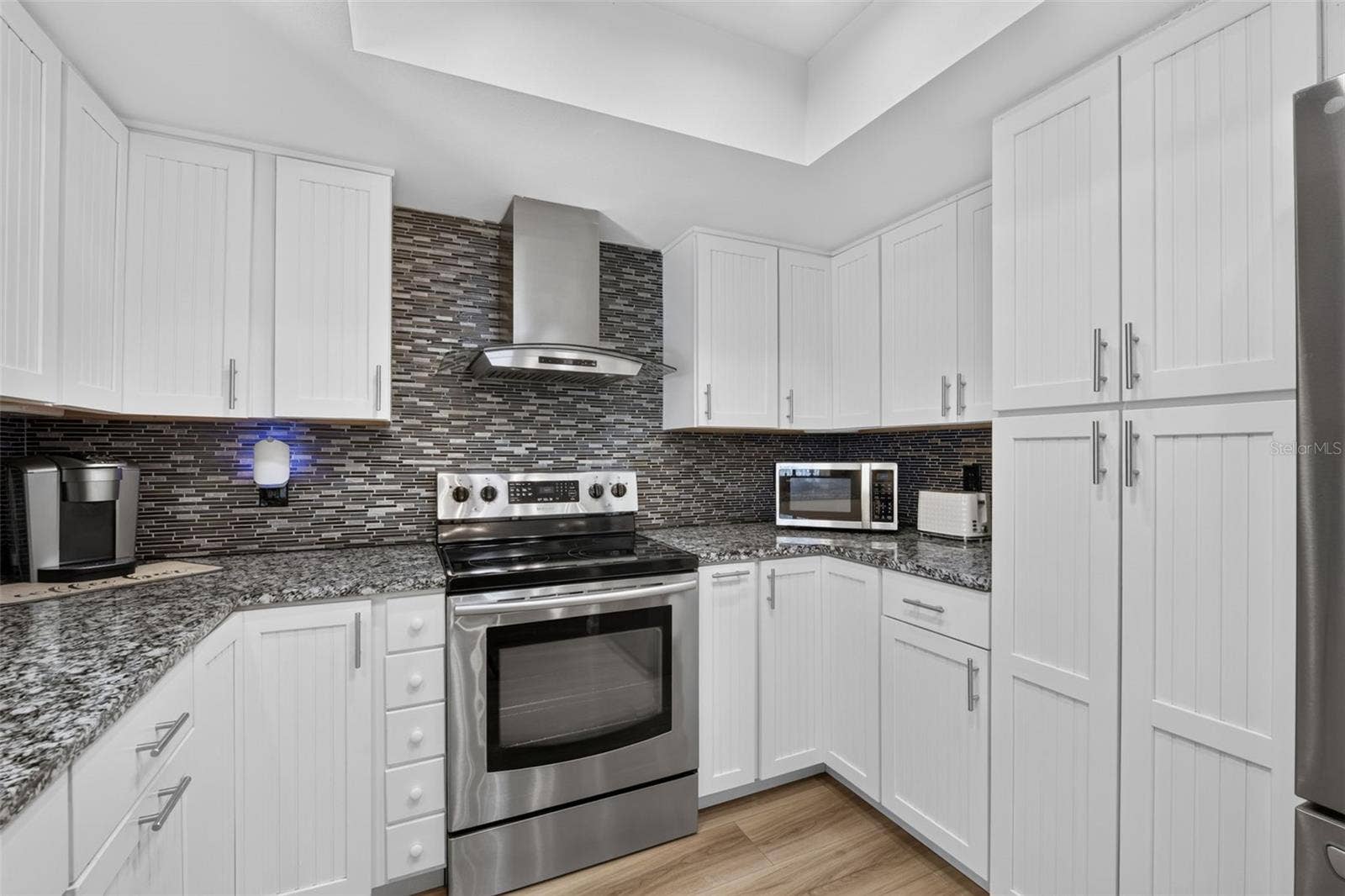 82 CIRCLEWOOD DRIVE, #A3-4, Venice, FL 34293 Plenty of cabinet space in this updated kitchen