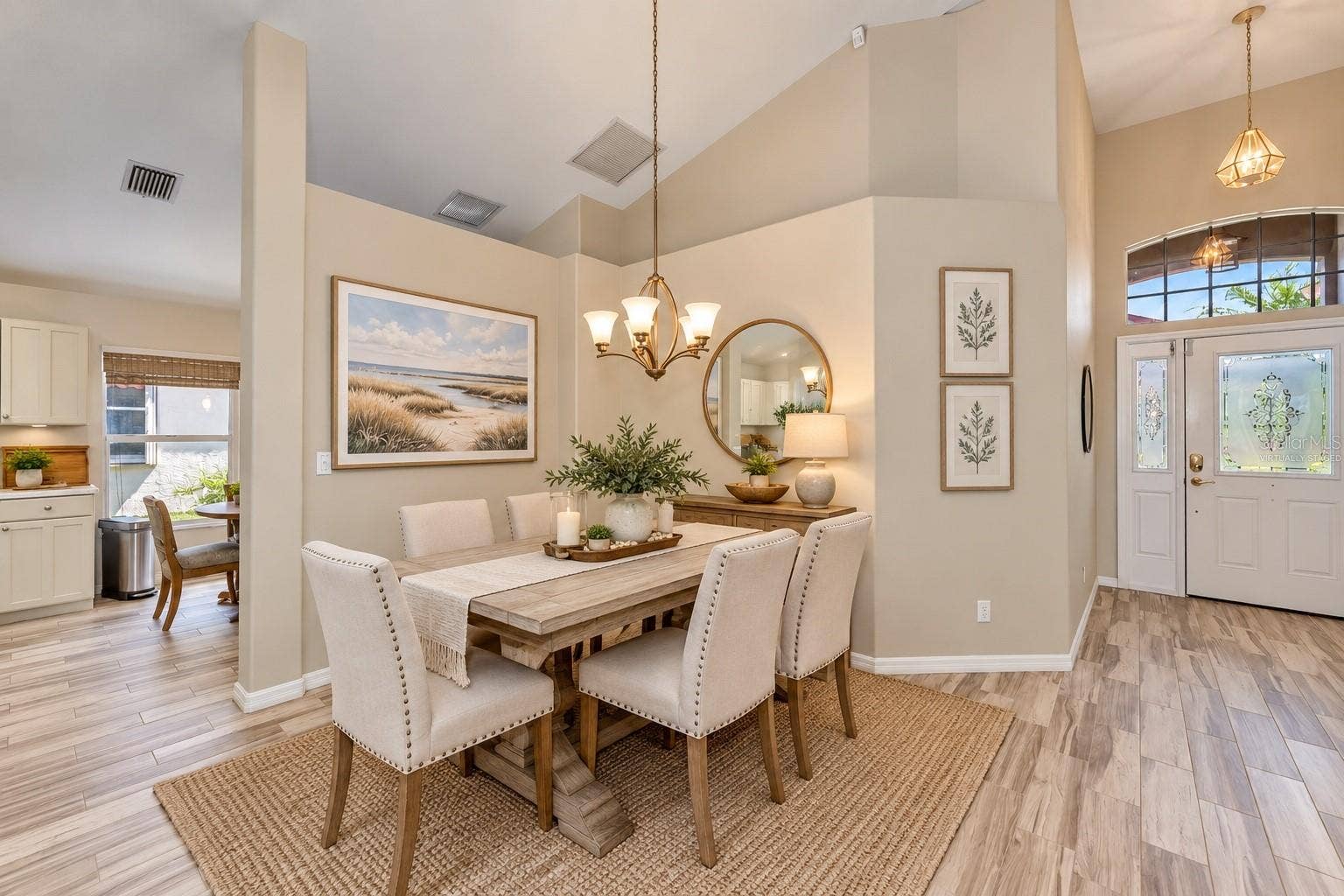 5113 FLAGSTONE DRIVE, Sarasota, FL 34238 Virtually Staged Plank tile flooring living areas and bedrooms.