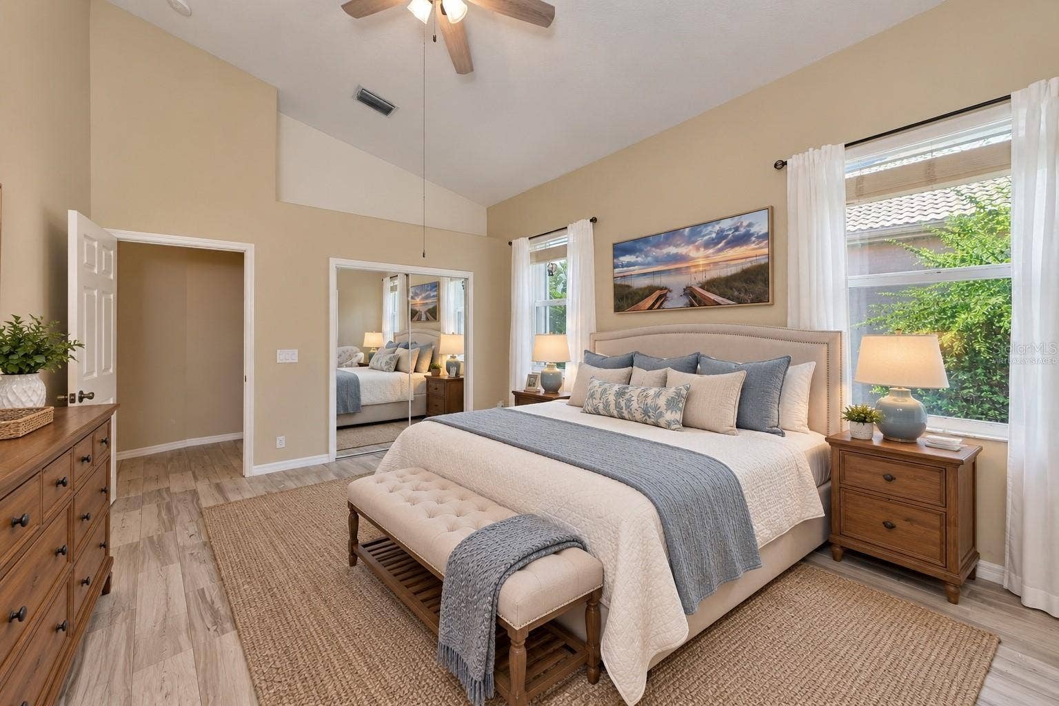 5113 FLAGSTONE DRIVE, Sarasota, FL 34238 Virtually Staged Primary suite, vaulted ceiling, & w/walk-in closet.