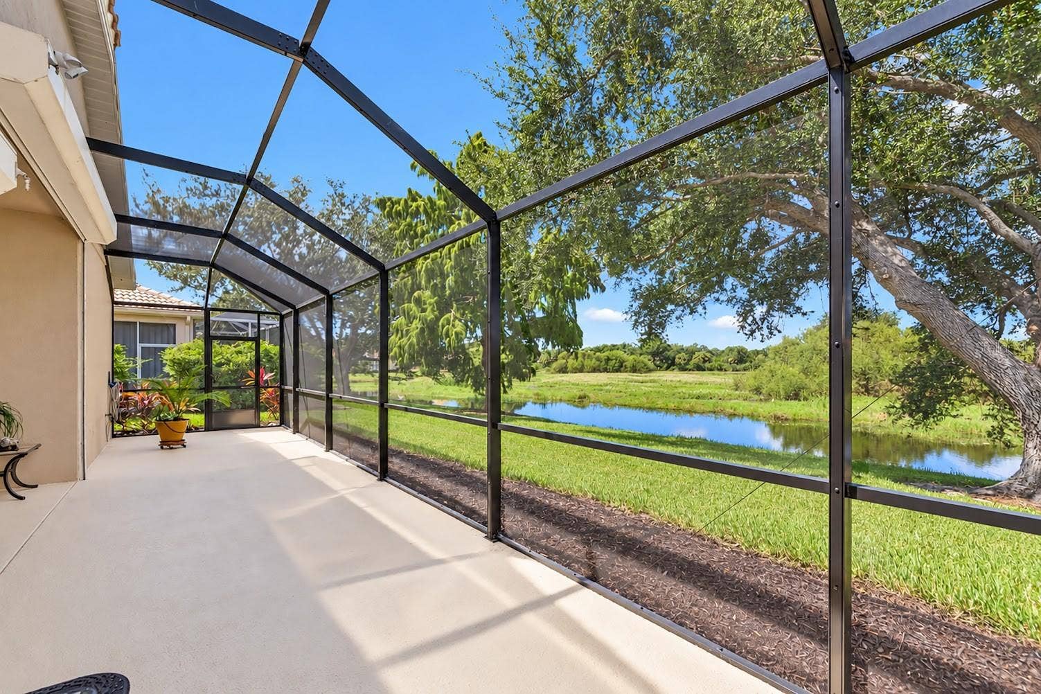 5113 FLAGSTONE DRIVE, Sarasota, FL 34238 Room for a deck spa w/lake and nature preserve.