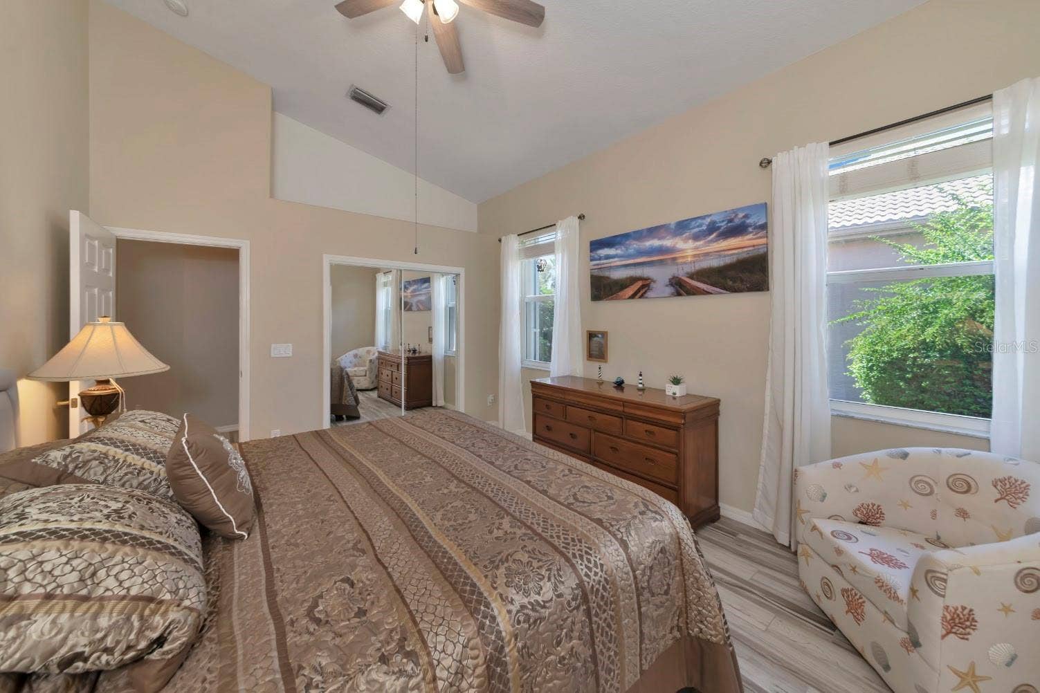 5113 FLAGSTONE DRIVE, Sarasota, FL 34238 Primary suite, vaulted ceiling, & w/walk-in closet.
