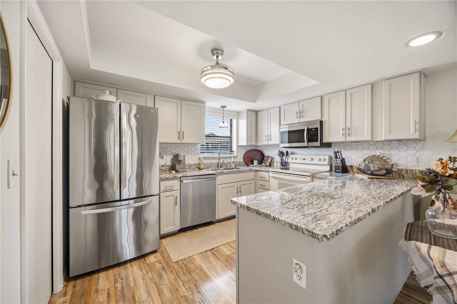 4260 PLACIDA ROAD, #17A, Englewood, FL 34224 large open kitchen with pantry