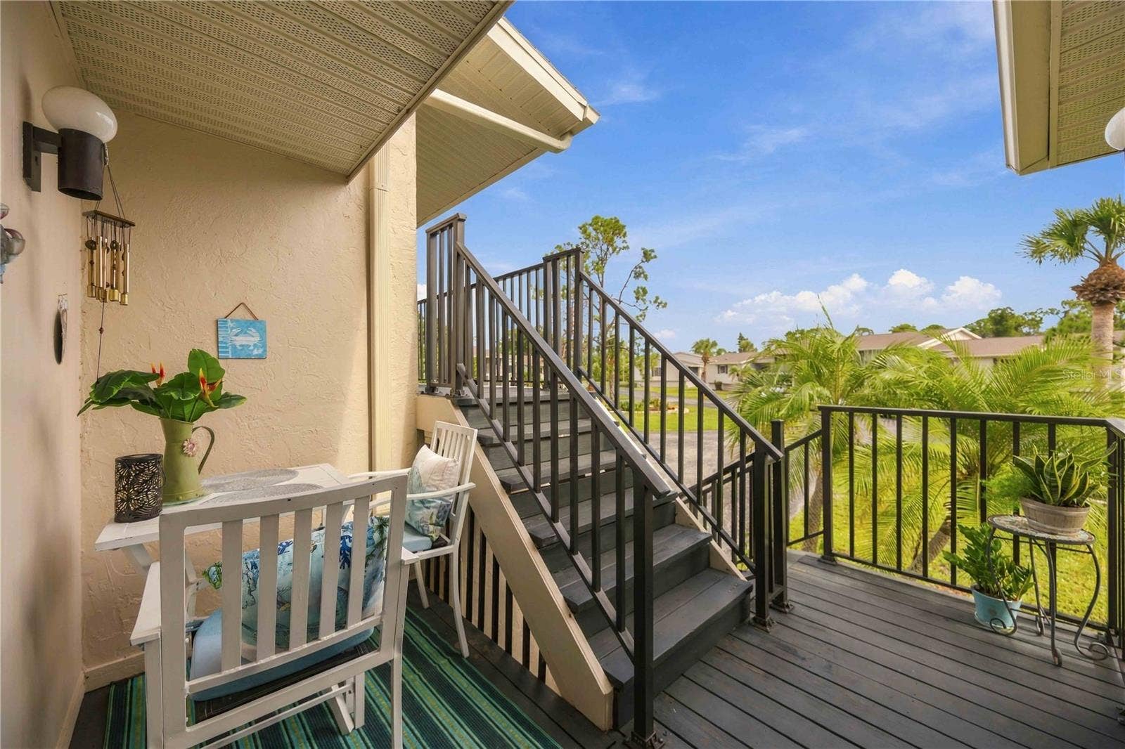 4260 PLACIDA ROAD, #17A, Englewood, FL 34224 first level, deck with sitting area