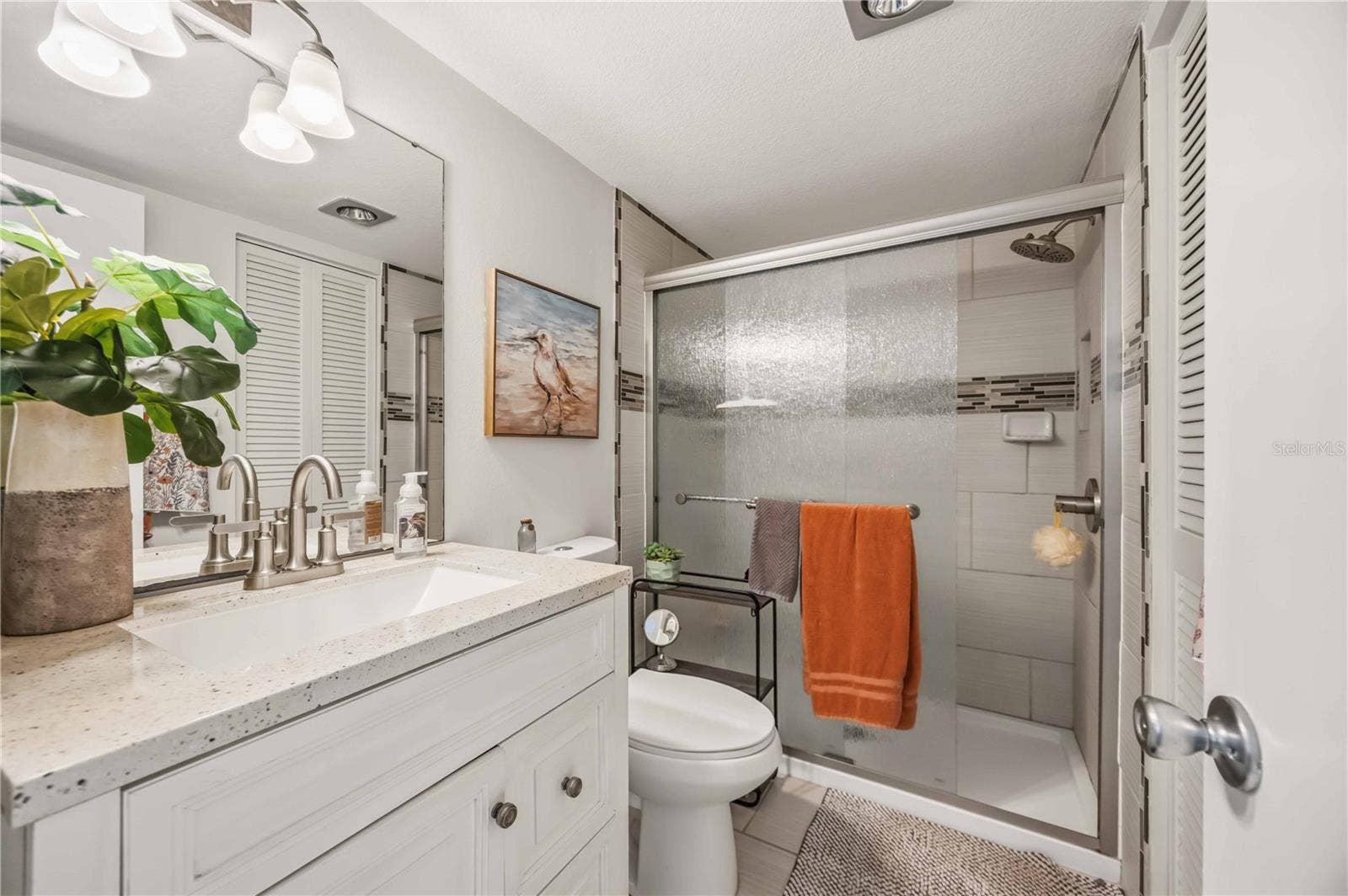 4260 PLACIDA ROAD, #17A, Englewood, FL 34224 primary bathroom / updated shower