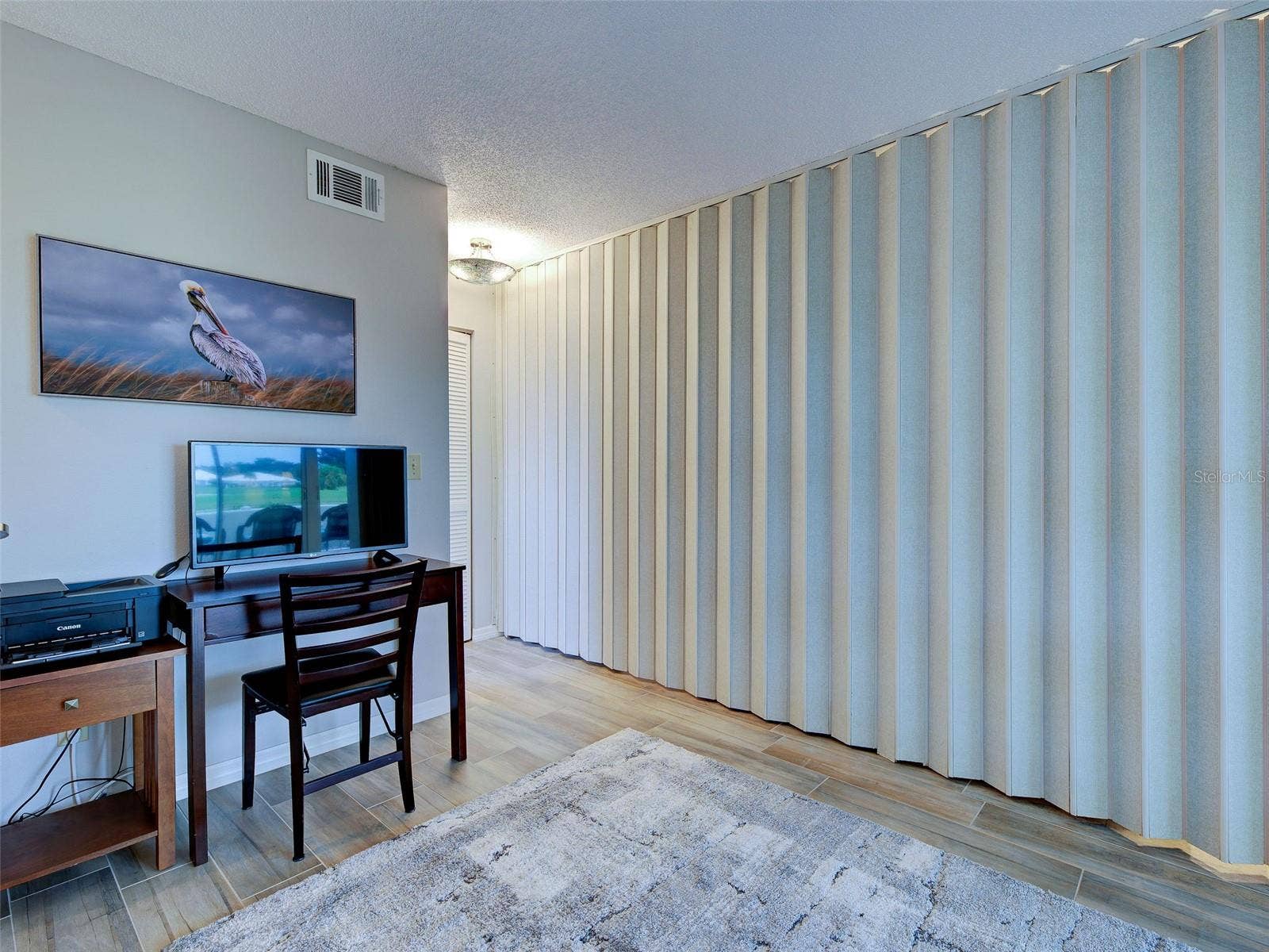 Flex room with the wall extended looking toward guest bathroom