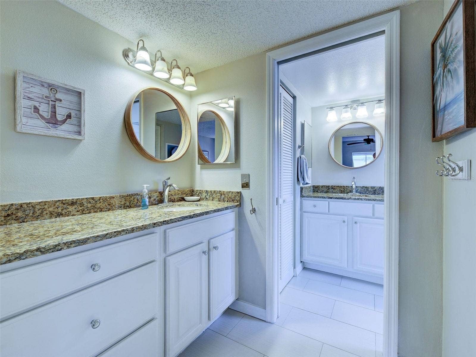 Primary Bath has dual sinks and separate vanities