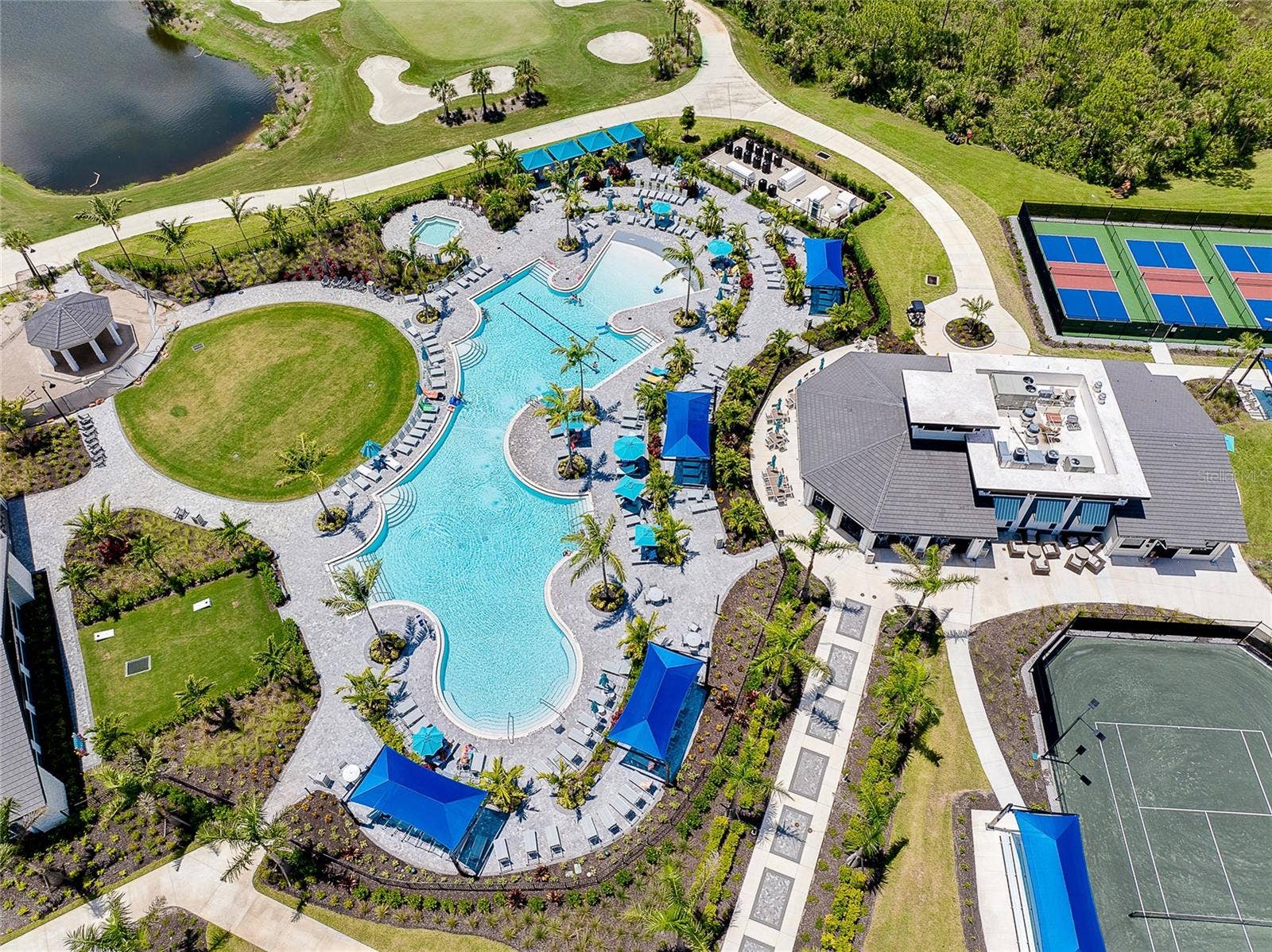 Resort style pool, tiki bar, tennis and pickle ball courts.