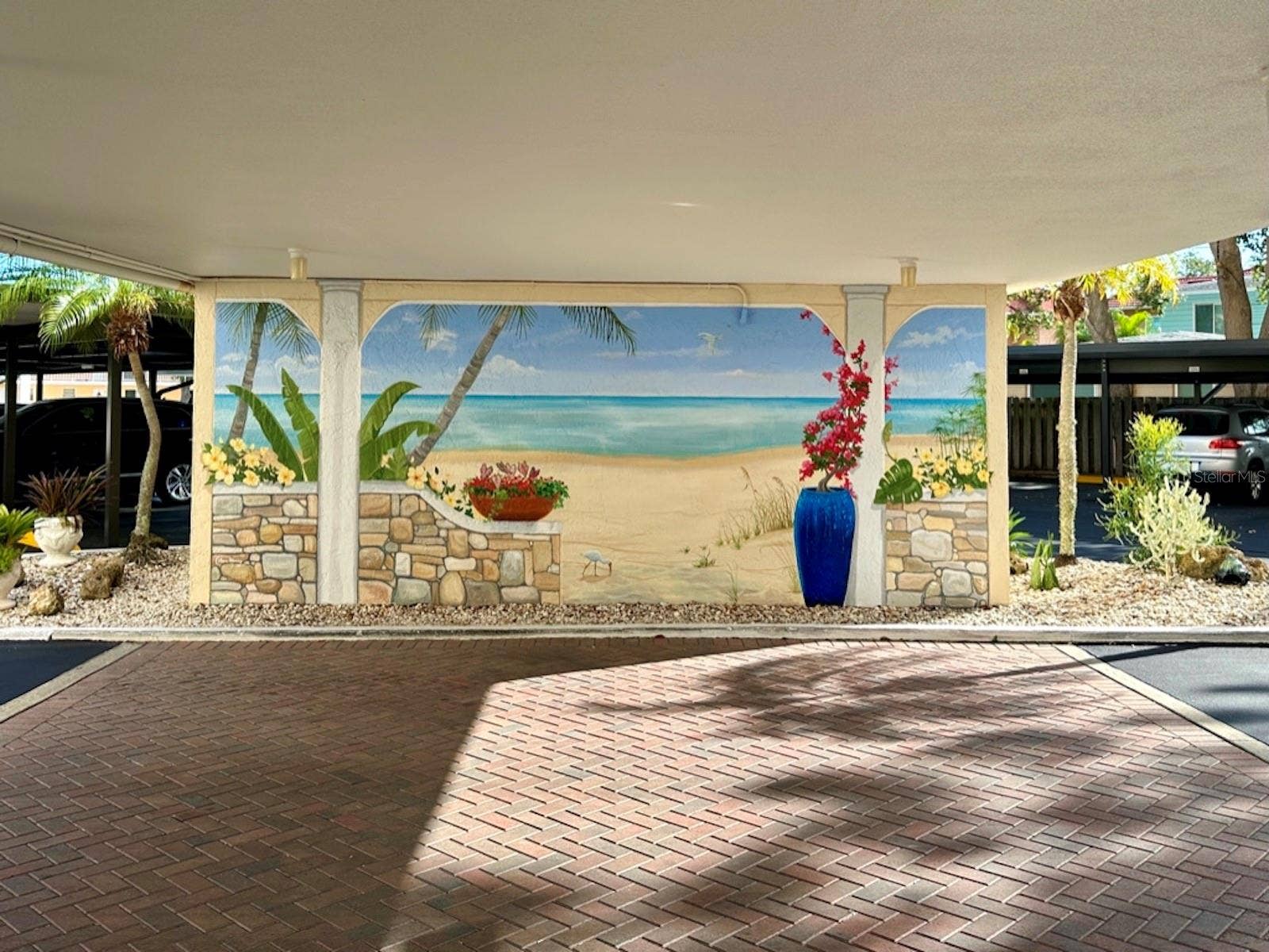 512 W VENICE AVENUE, #607, Venice, FL 34285 A covered drive-through entrance offers a shelter on rainy days