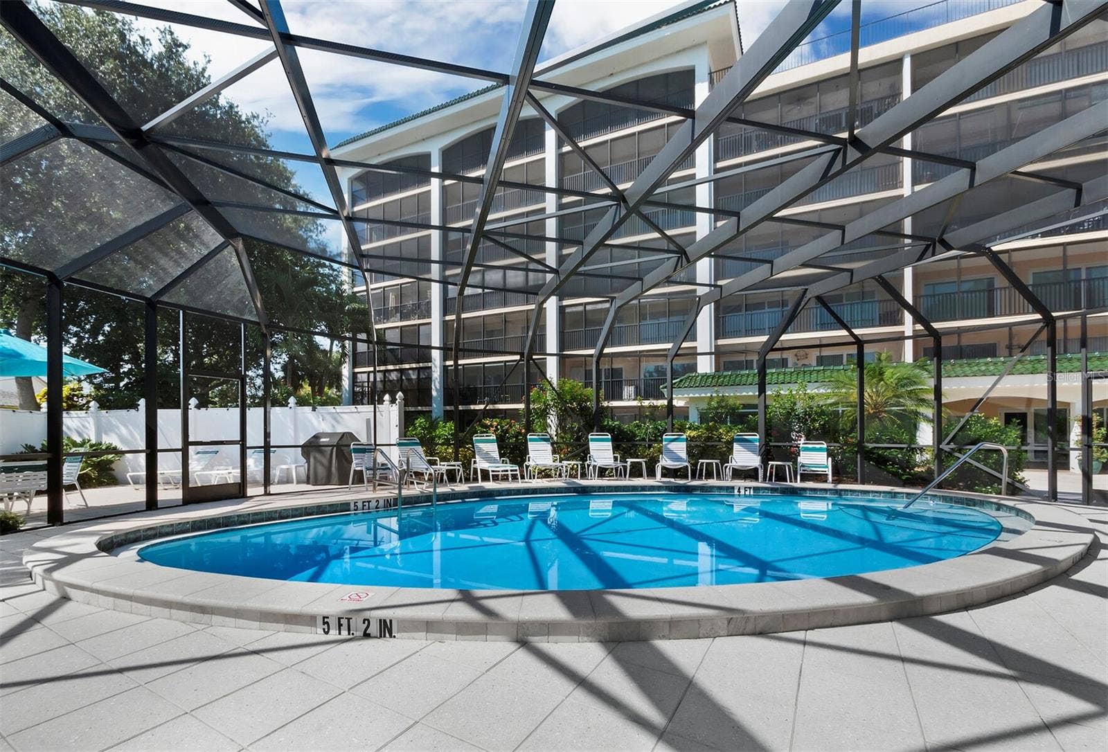512 W VENICE AVENUE, #607, Venice, FL 34285 Enjoy a refreshing swim in the screened community pool, sheltered from insects