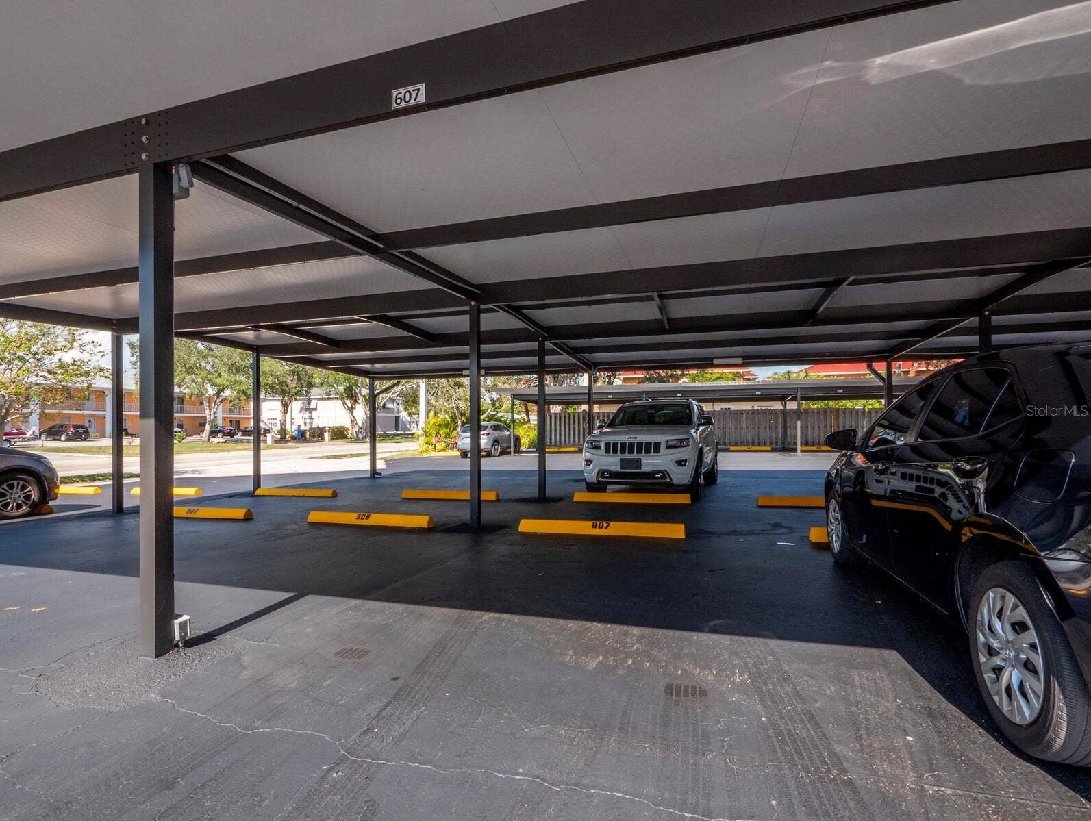 512 W VENICE AVENUE, #607, Venice, FL 34285 Assigned parking-1 spot/unit and additional guest parking