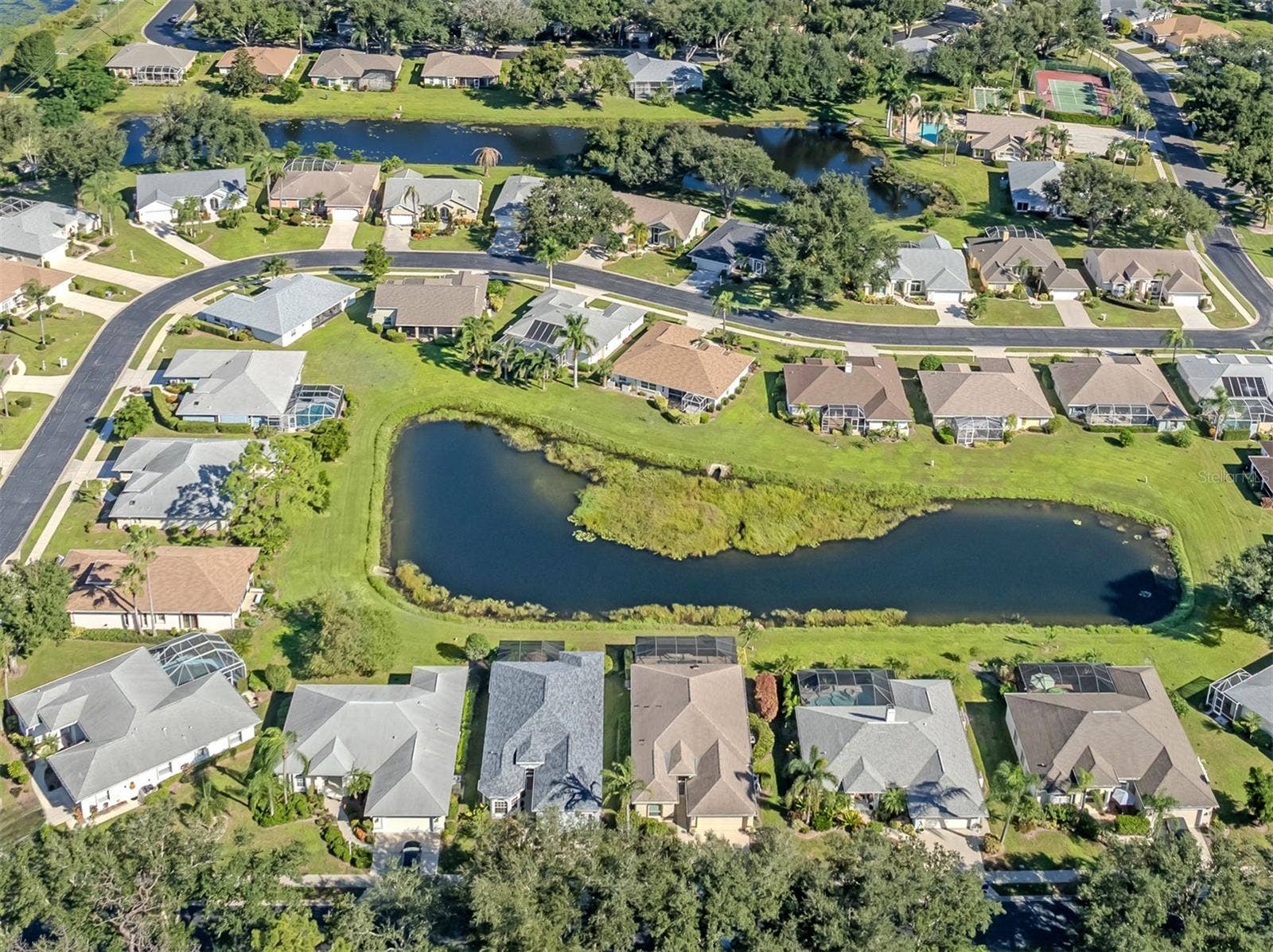 Take a look at the bigger picture! Charming homes, winding streets, and picturesque waterways come together to showcase the wonderful character and peaceful atmosphere of the Isles of Chestnut Creek!