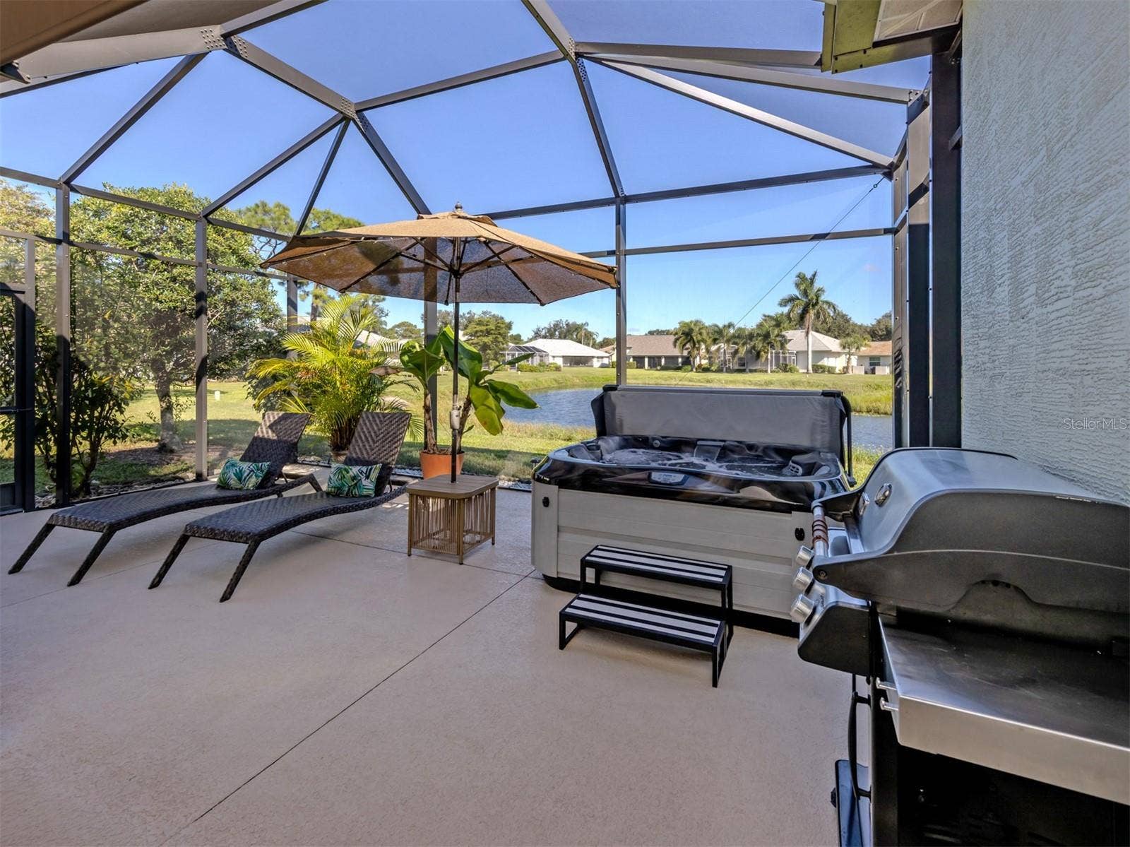 Welcome to your own little slice of Florida paradise! Beautifully expanded in 2023, this fabulous screened lanai is all about sunshine, sparkling lake views, and enjoying the Florida lifestyle! With plenty of space to lounge, entertain, or sip something refreshing while soaking in the peaceful waterfront scenery, this is the kind of outdoor retreat you'll never want to leave!