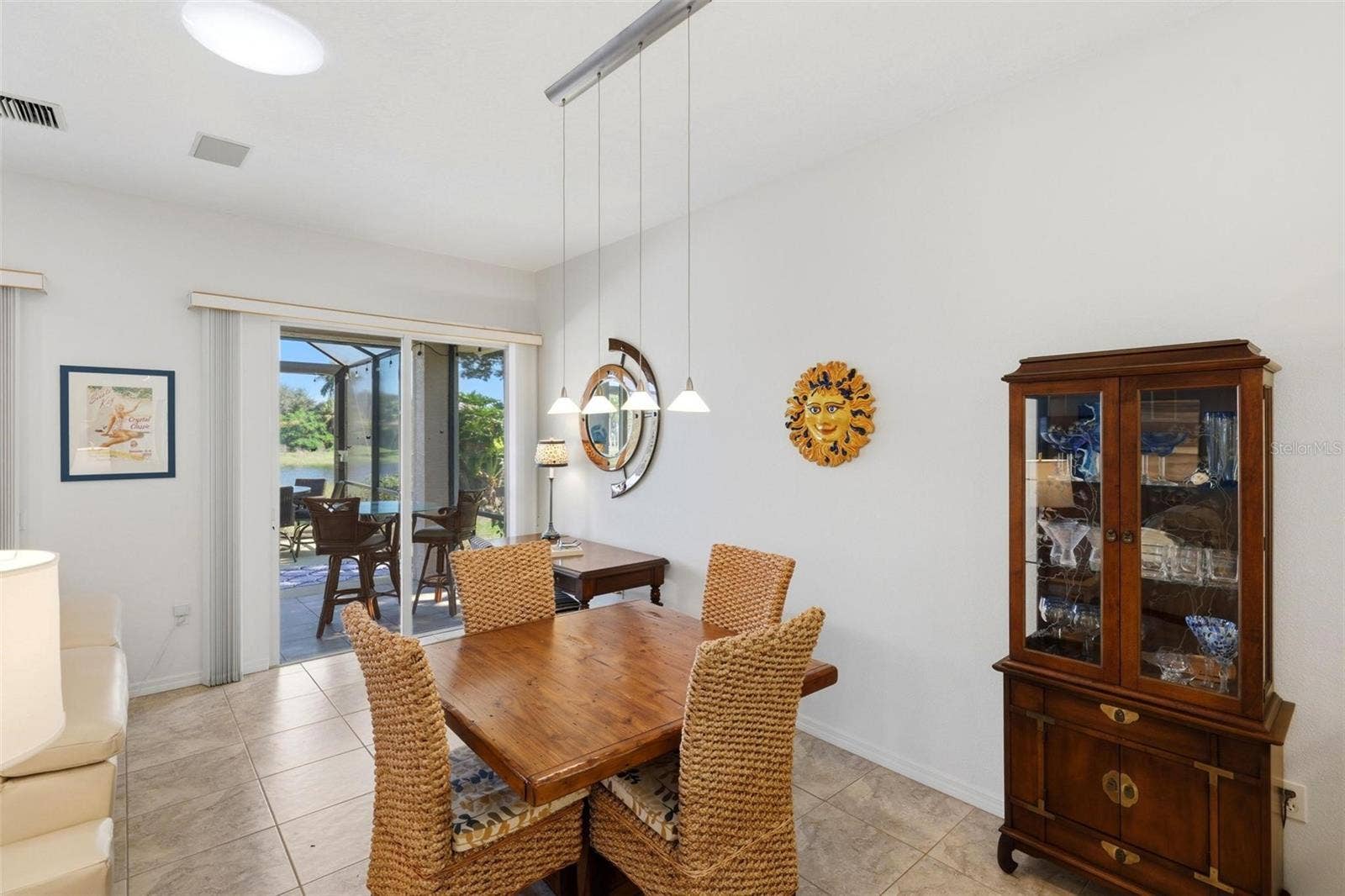 687 LAKESCENE DRIVE, Venice, FL 34293 Dining area with lake views