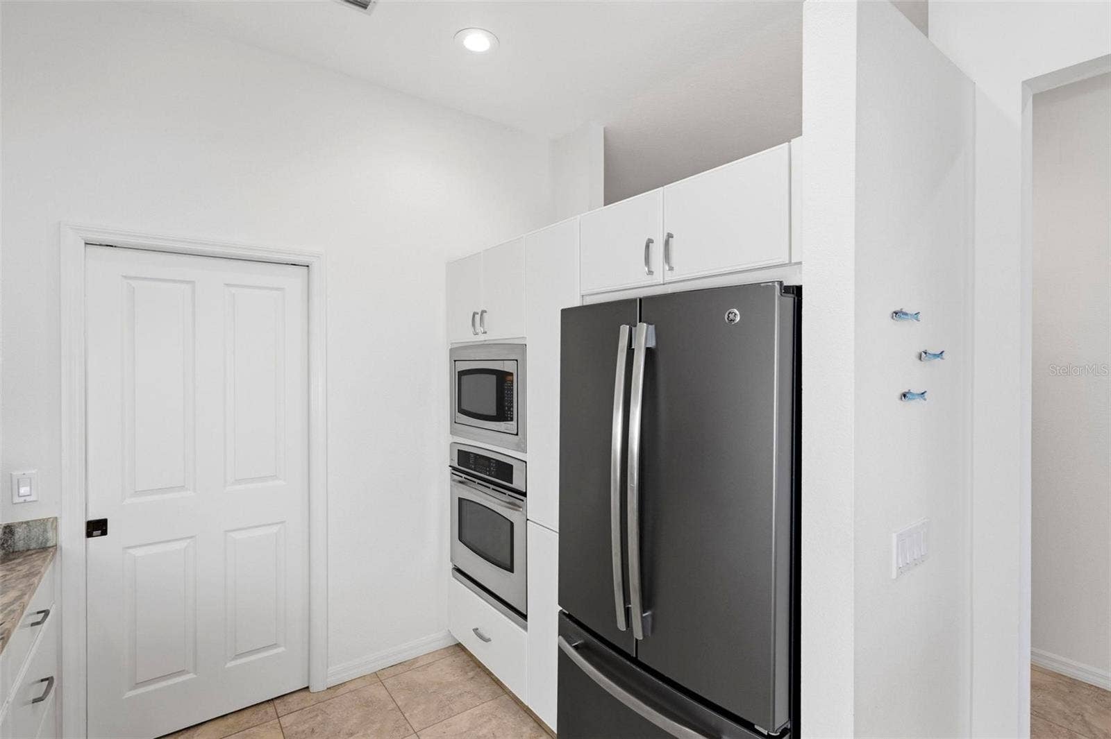 687 LAKESCENE DRIVE, Venice, FL 34293 Kitchen with built-in wall oven and microwave