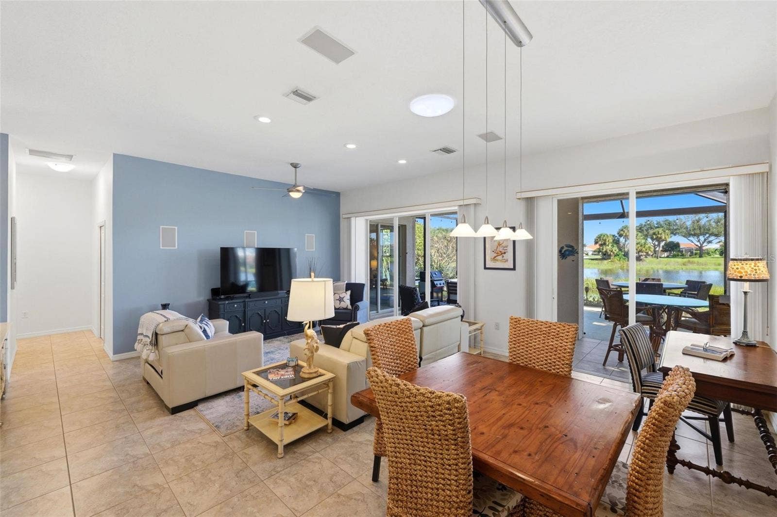 687 LAKESCENE DRIVE, Venice, FL 34293 Living area with hallway to bedrooms