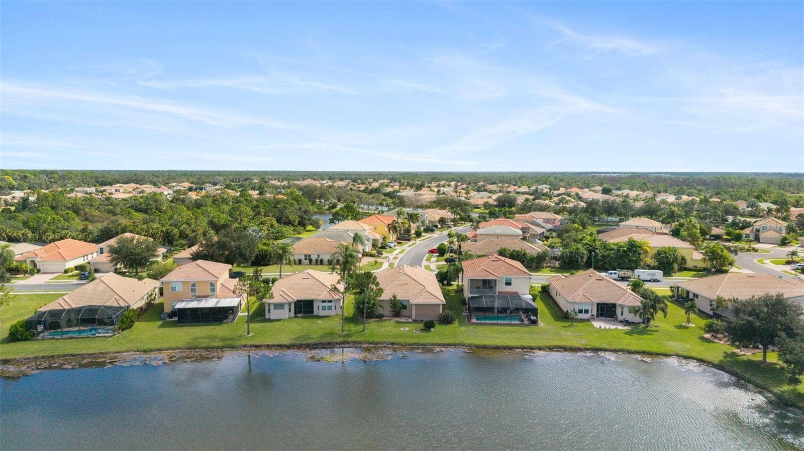 2216 WEAVER BIRD LANE, Venice, FL 34292 Lots of greenery in addition to lakes