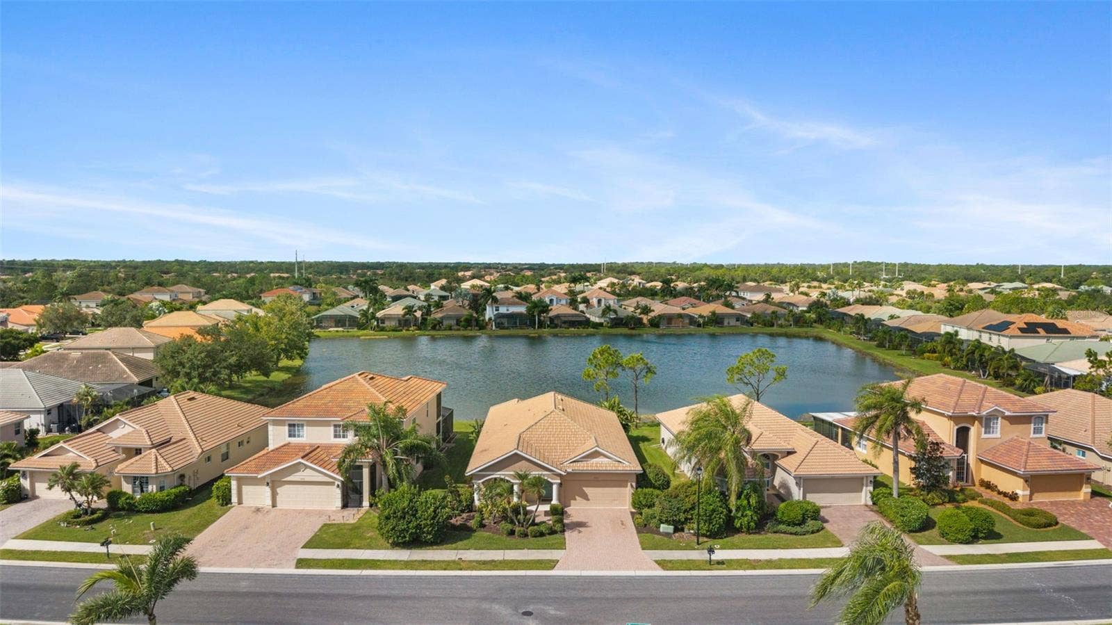 2216 WEAVER BIRD LANE, Venice, FL 34292 Drone views of home and neighborhood