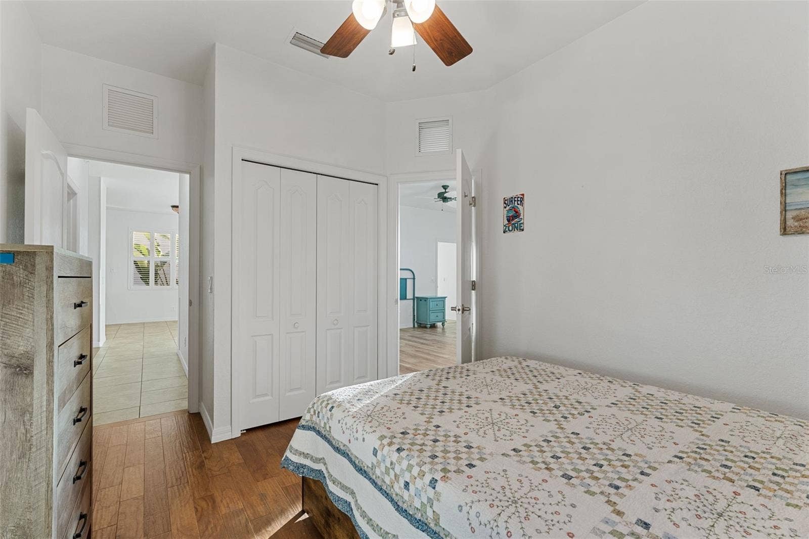 2216 WEAVER BIRD LANE, Venice, FL 34292 Entrance to hallway on the left, to the Primary Bedroom on the right