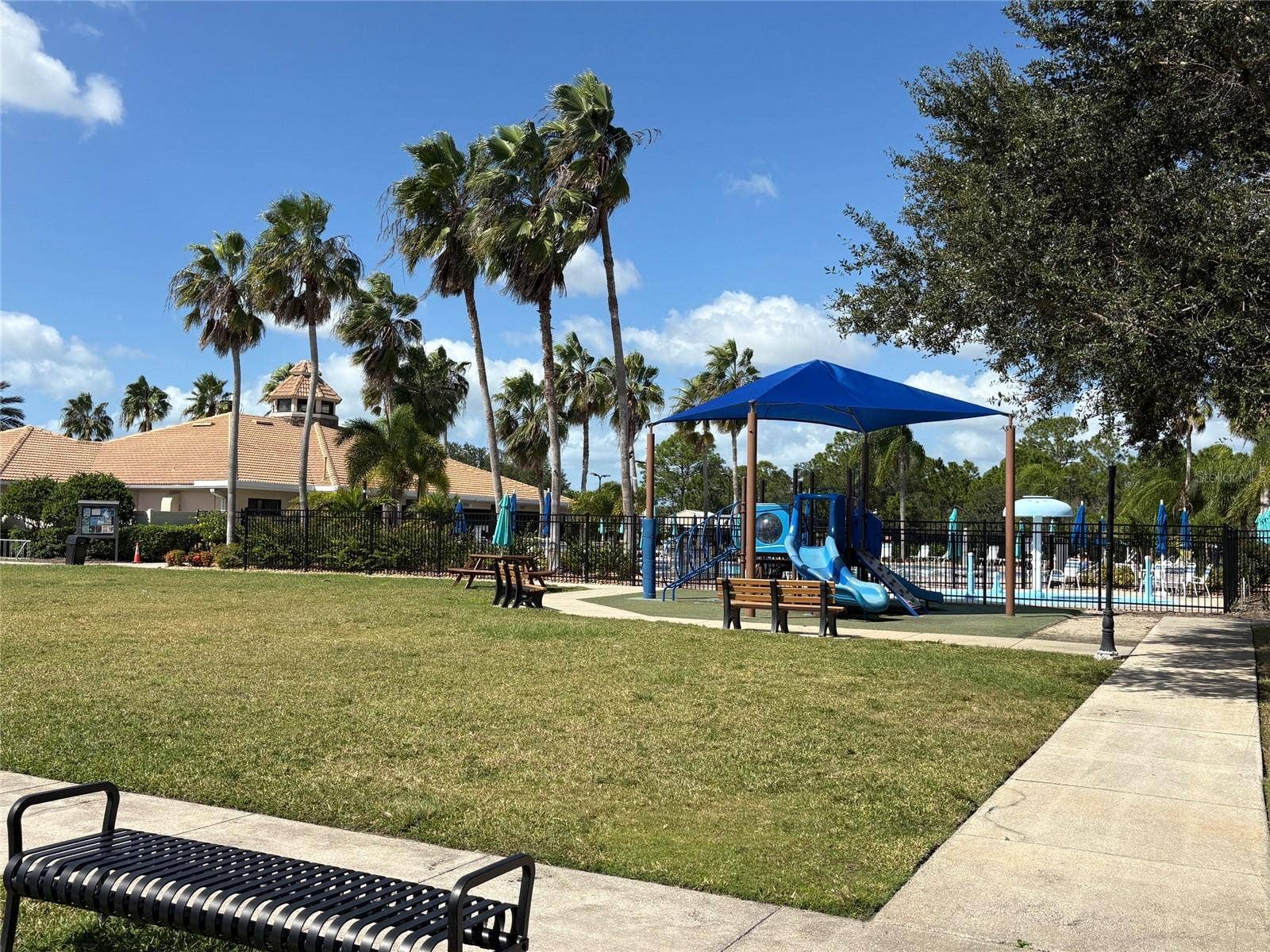 2216 WEAVER BIRD LANE, Venice, FL 34292 View of children's play area and clubhouse