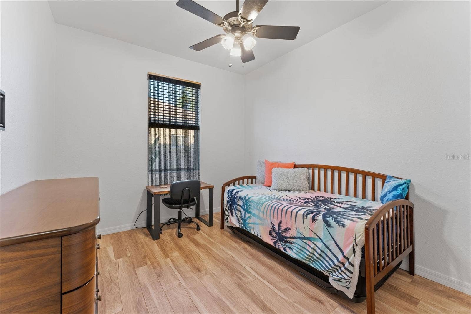2216 WEAVER BIRD LANE, Venice, FL 34292 Guest Room with warm engineering hardwood flooring; trundle bed here but could house a double or queen bed