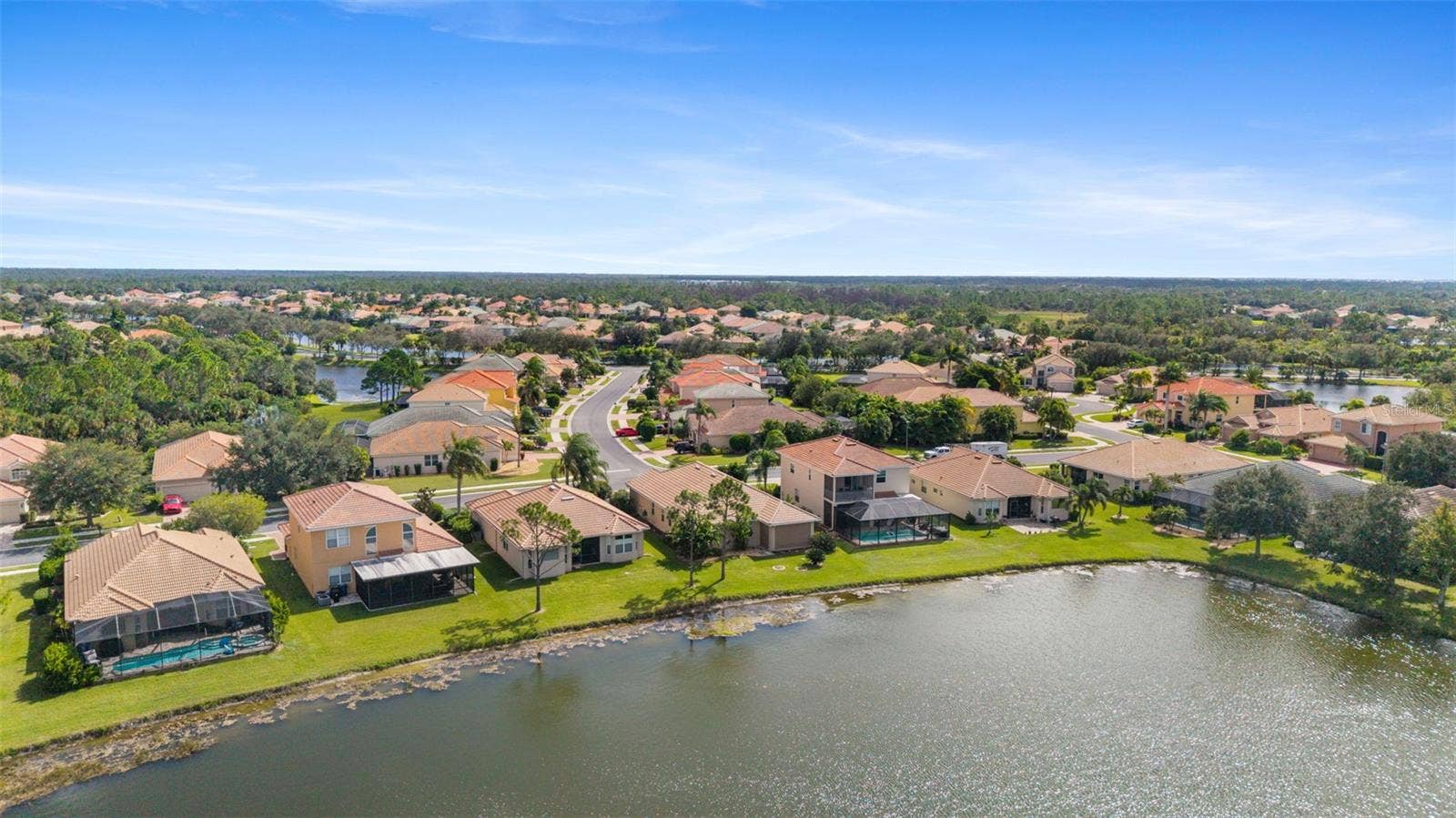 2216 WEAVER BIRD LANE, Venice, FL 34292 I count 3 lakes but there are more!