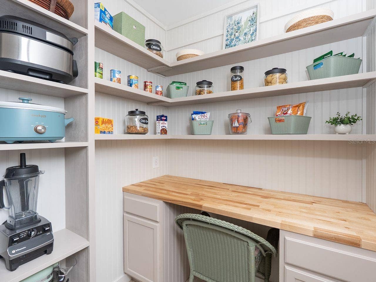 71 CAYMAN ISLES BOULEVARD, Englewood, FL 34223 walk in pantry and small appliance closet with built in desk