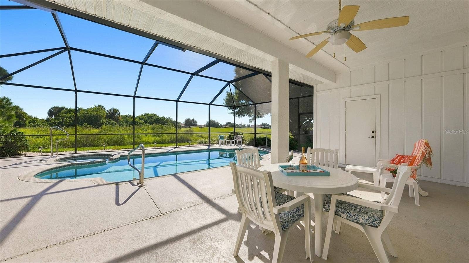 12 MEDALIST COURT, Rotonda West, FL 33947 HUGE covered lania space!