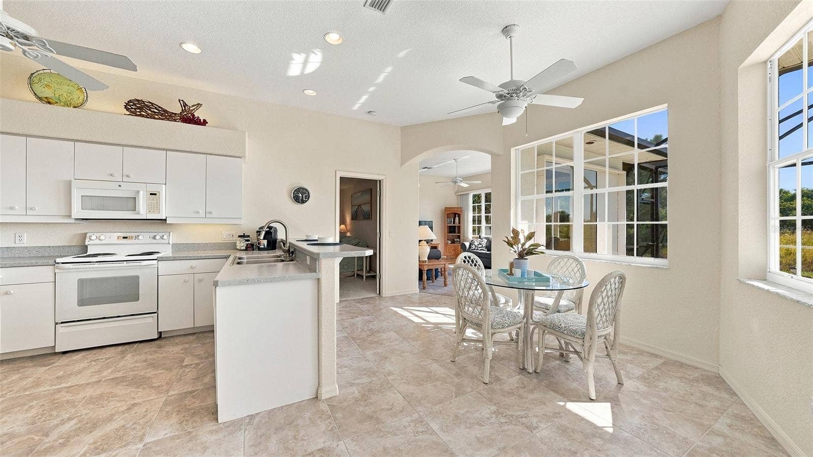 12 MEDALIST COURT, Rotonda West, FL 33947 breakfast bar and dinette area