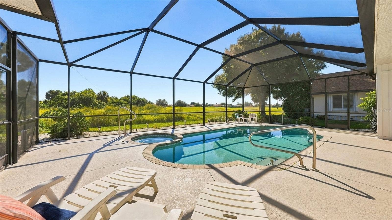 12 MEDALIST COURT, Rotonda West, FL 33947 private view of greenspace and then the golf course