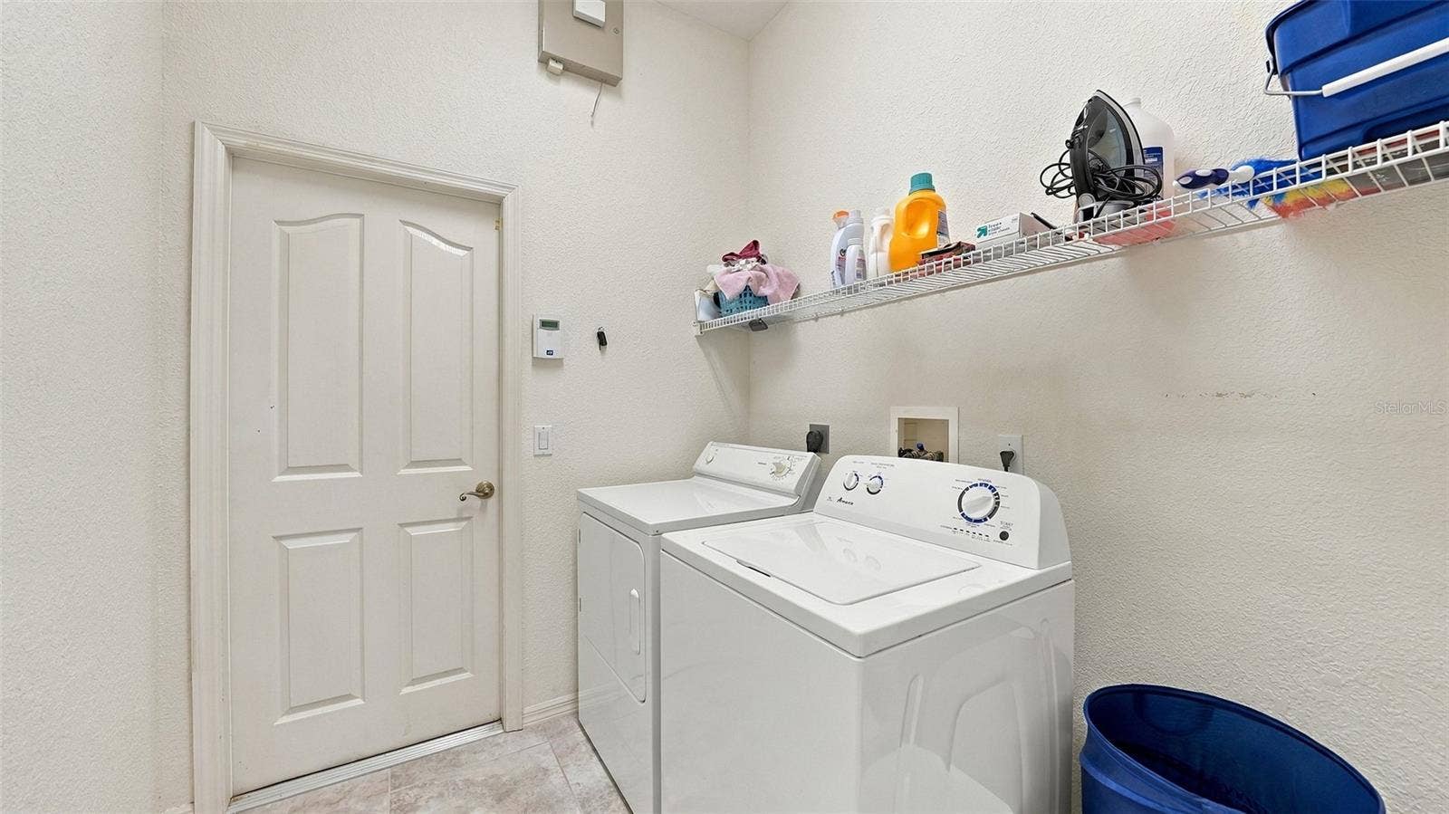 12 MEDALIST COURT, Rotonda West, FL 33947 there is a utlitiy sink in the garage