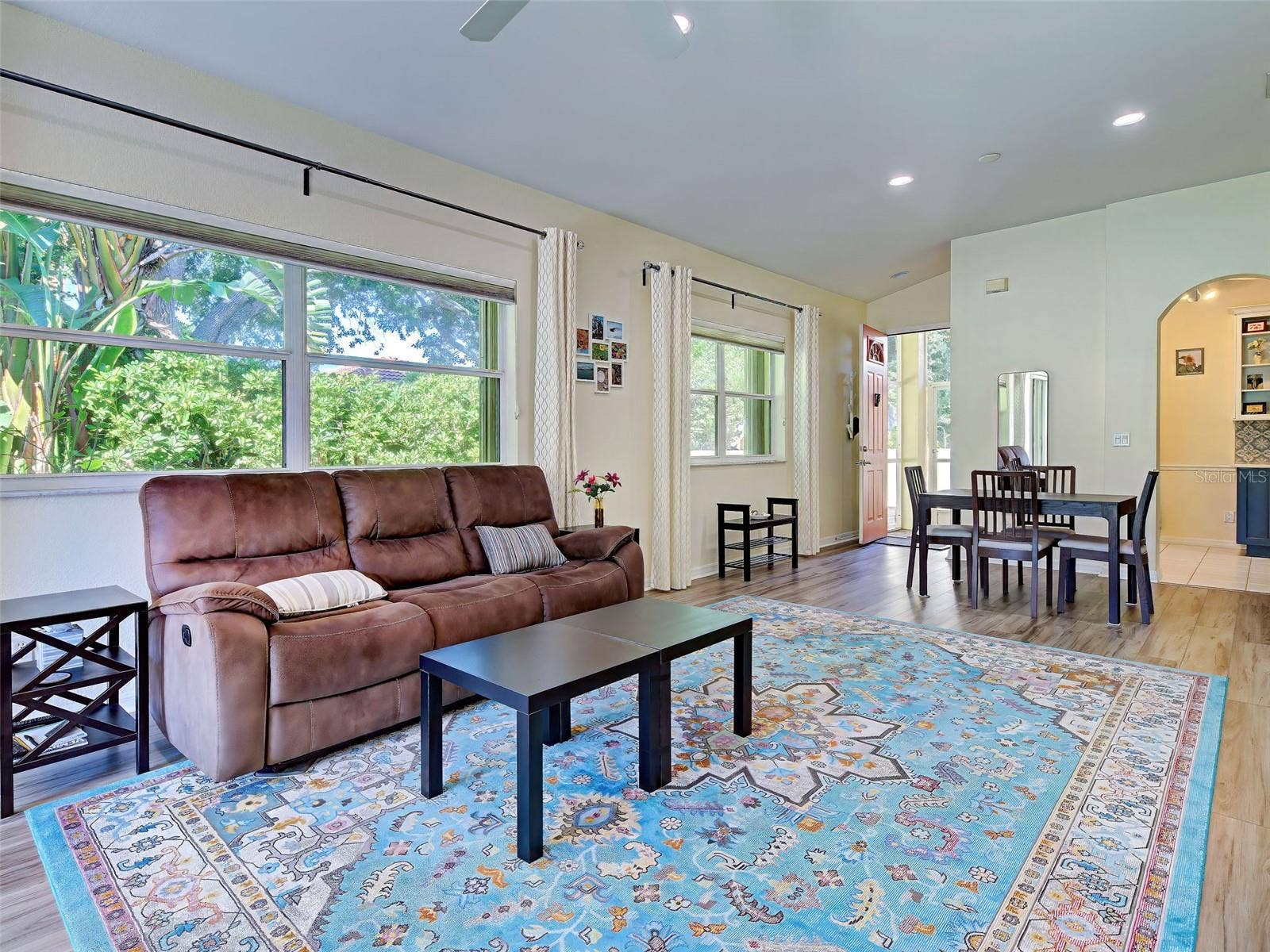 Living room and dining room has plenty of natural light