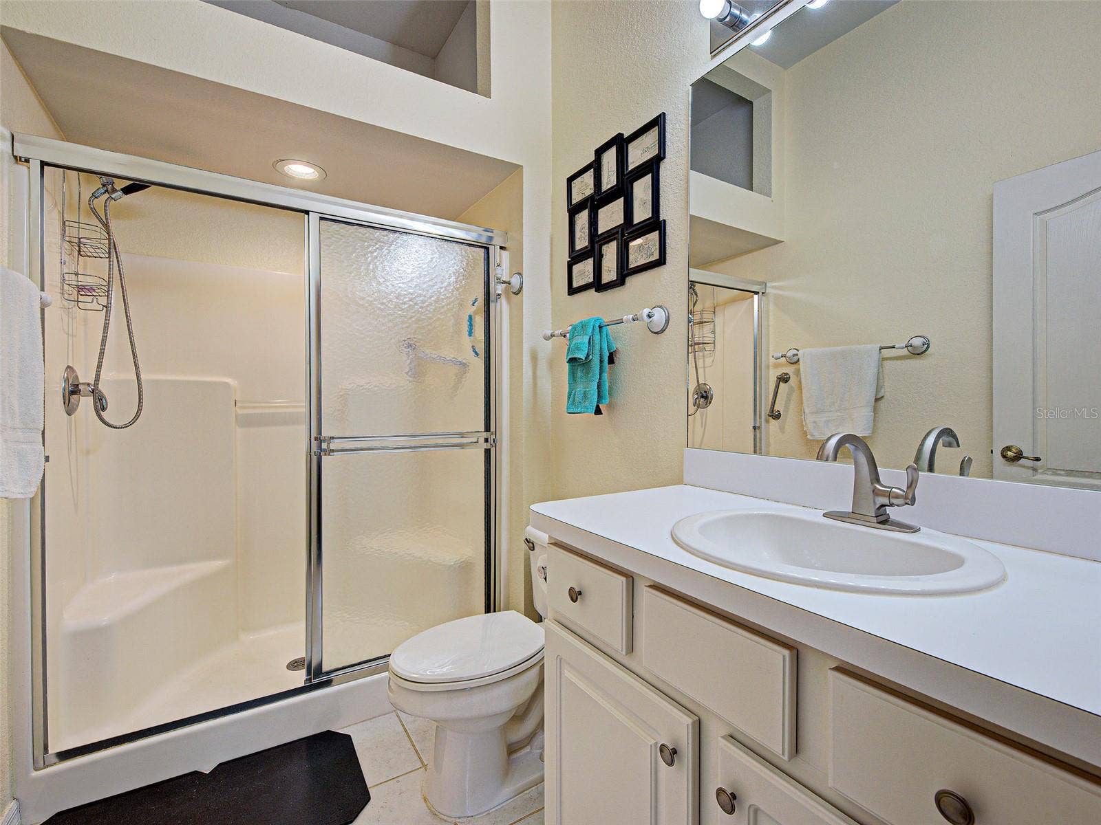 The ensuite bathroom in the primary bedroom