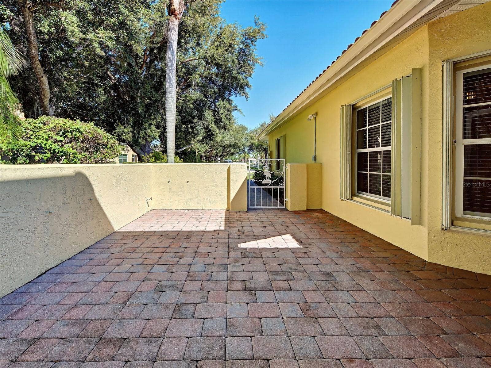 Windows have Accordion Hurricane Shutters
