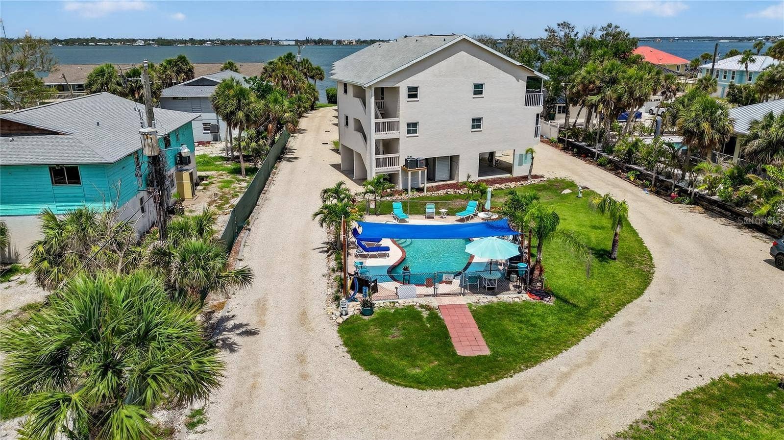 5031 N BEACH ROAD, #118, Englewood, FL 34223 Aerial View of Manasota Shores with Lemon Bay in the Background